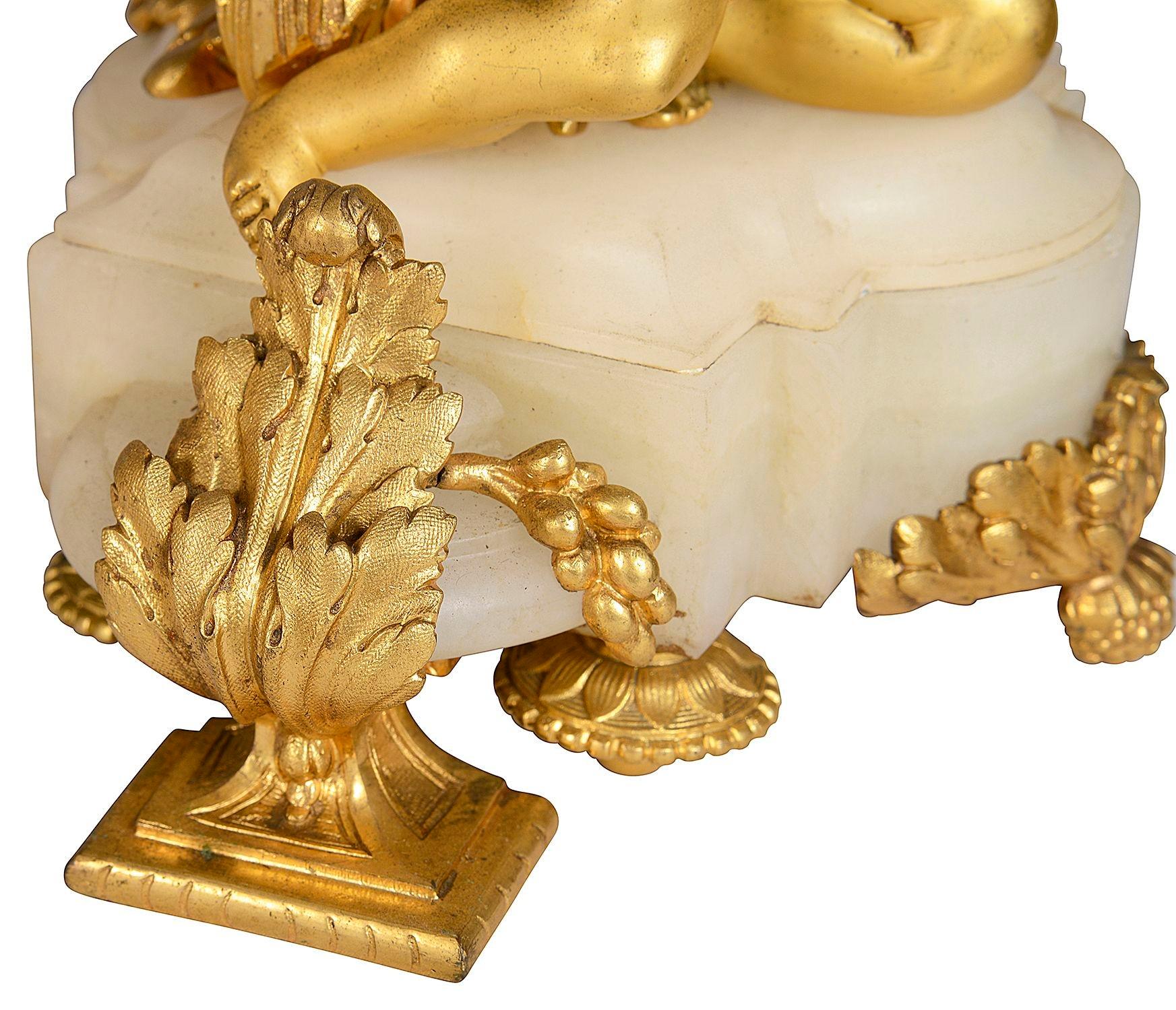 19th Century French marble and ormolu clock garniture. For Sale 4