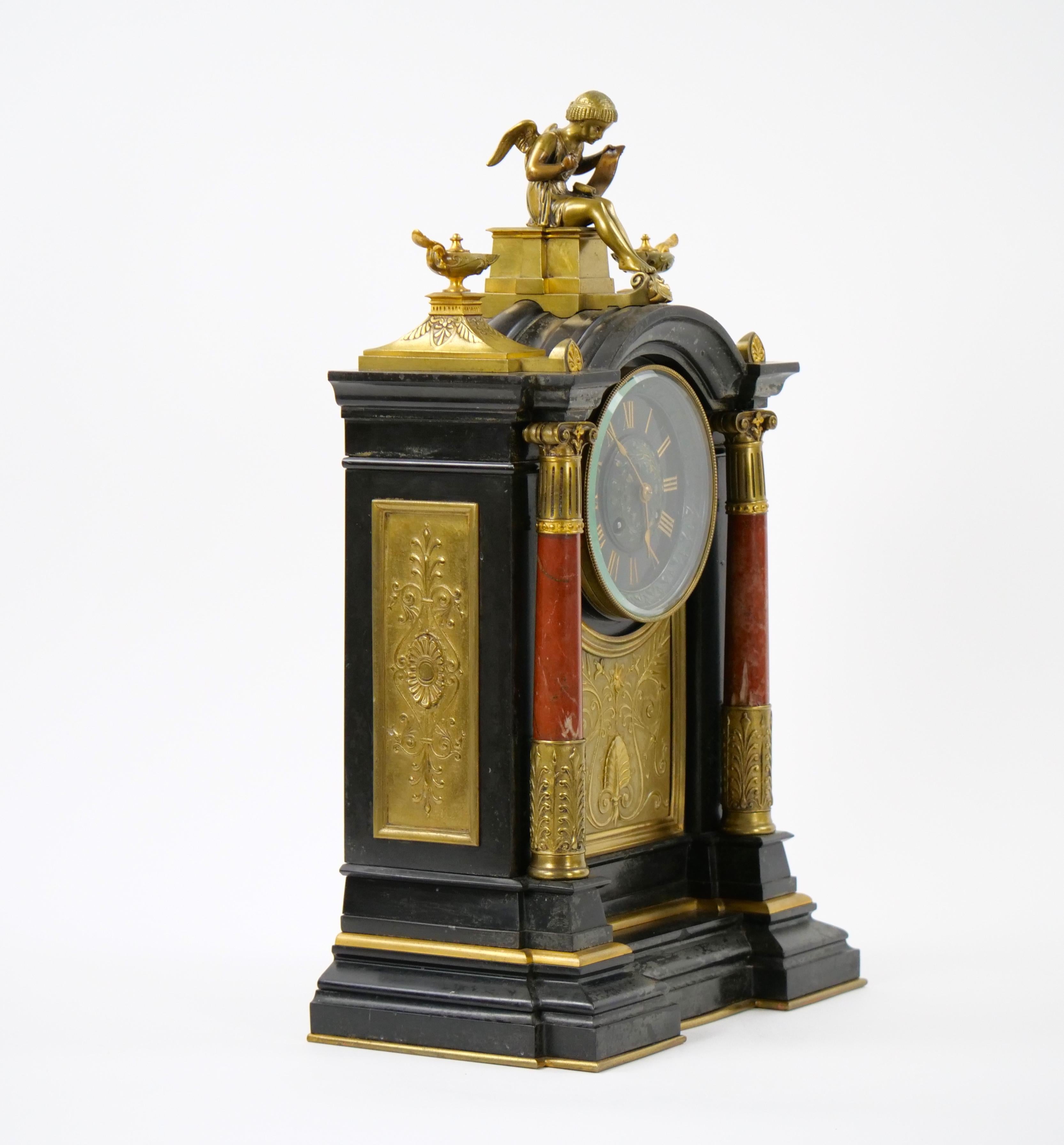 Transport yourself to the grandeur of the 19th century with this exquisite French Marble and Bronze Figural Mantel Clock. A true masterpiece of artistry and craftsmanship, this clock is adorned with intricate details that capture the essence of an