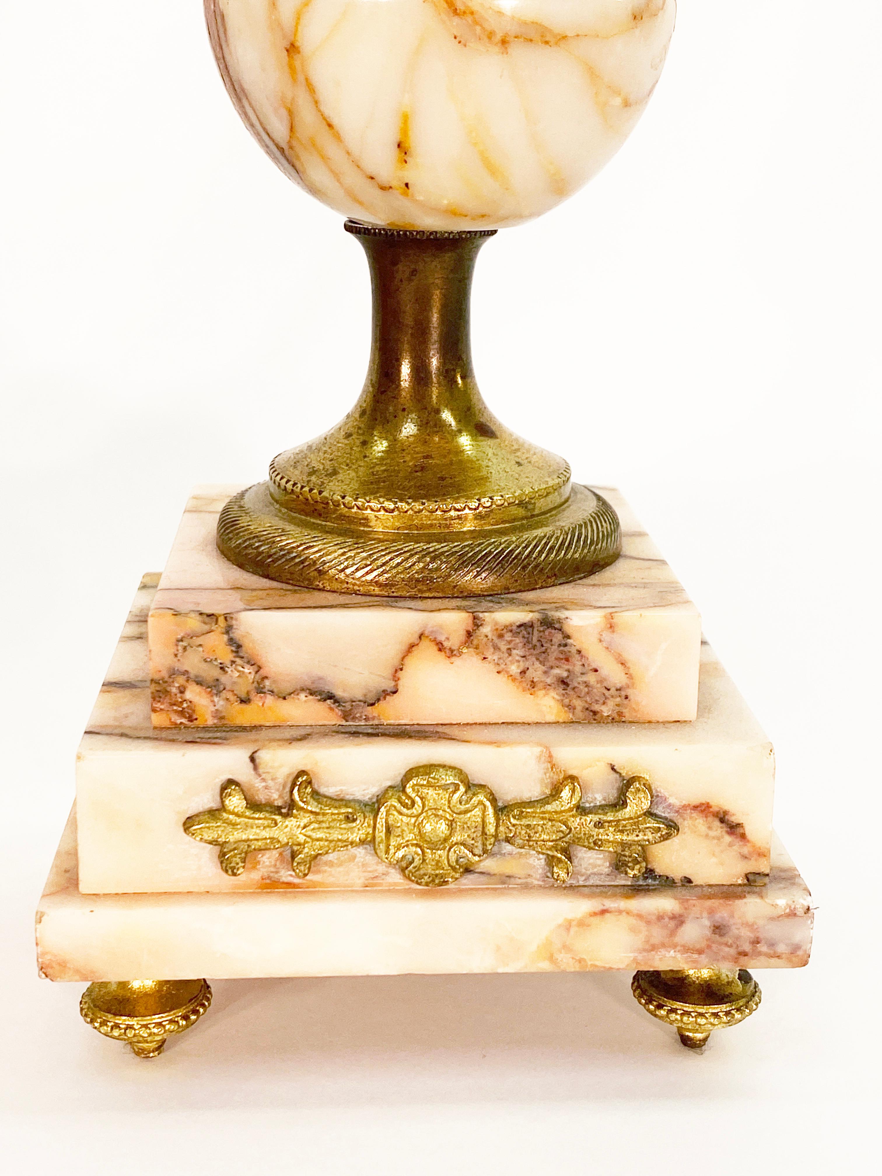 Polished 19th Century French Marble and Bronze Garniture Clock