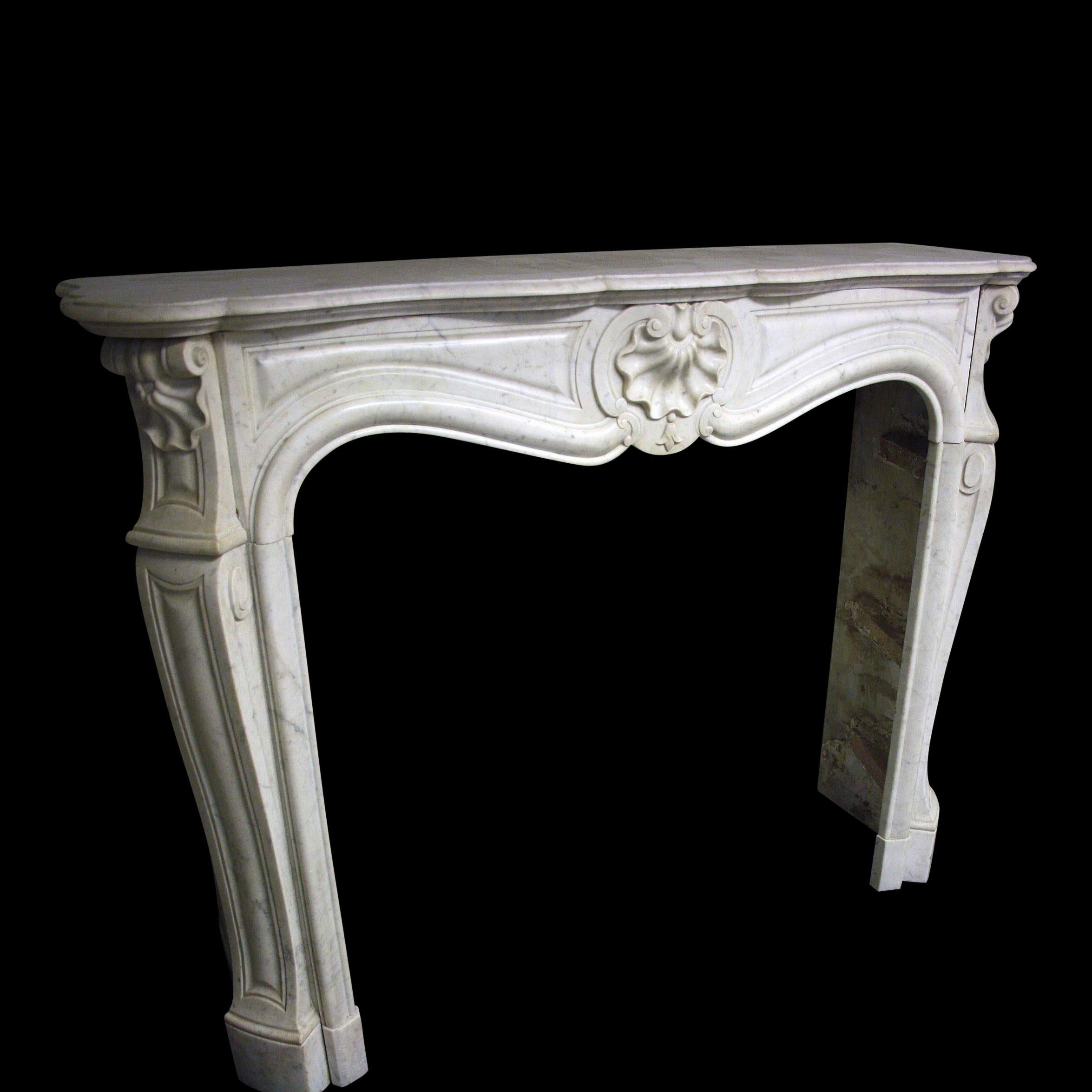 A 19th century French marble chimneypiece in Louis XV manner.