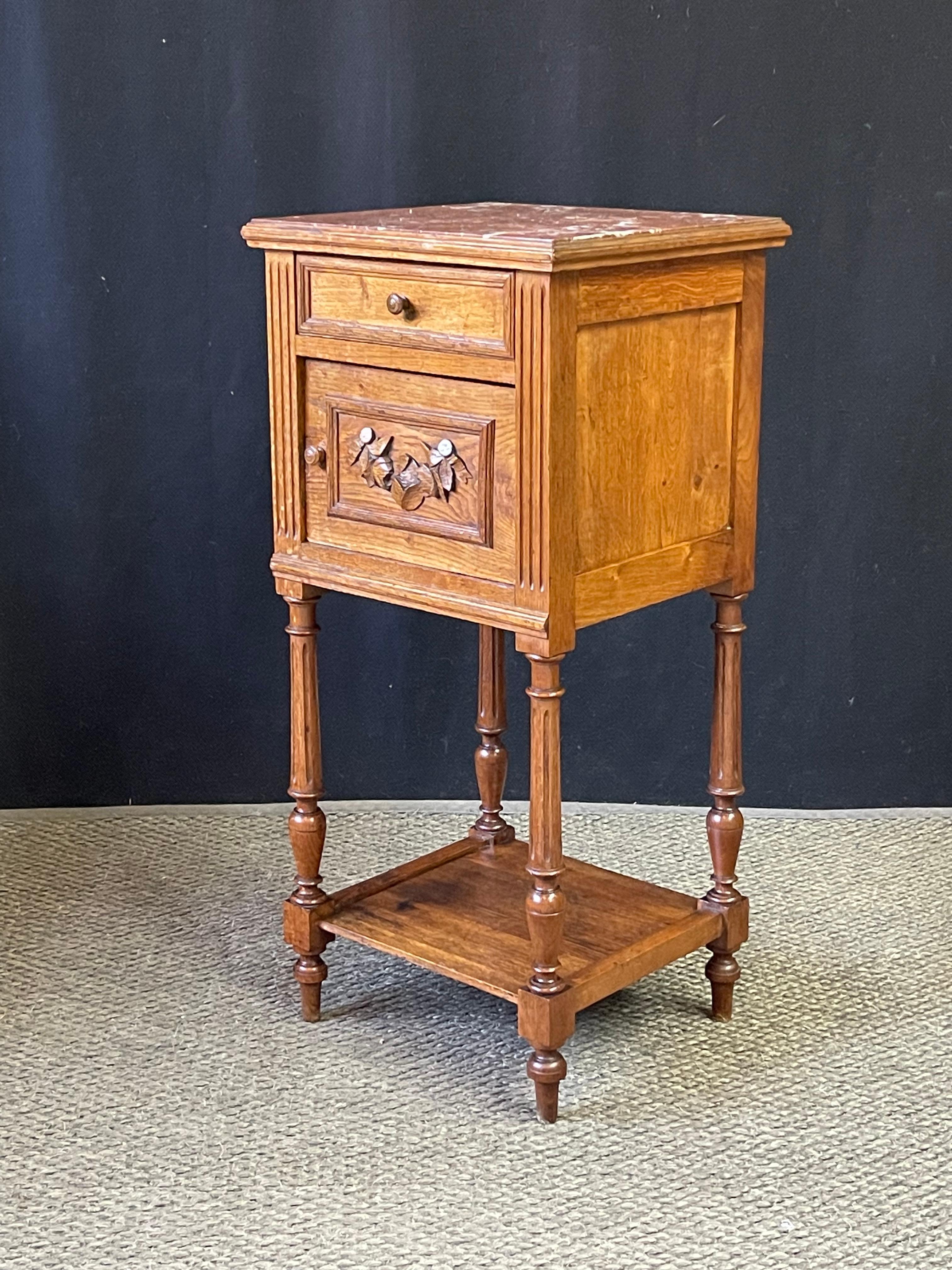 Late 19th Century French bedside table with elegant proportions just right for that place where you need 