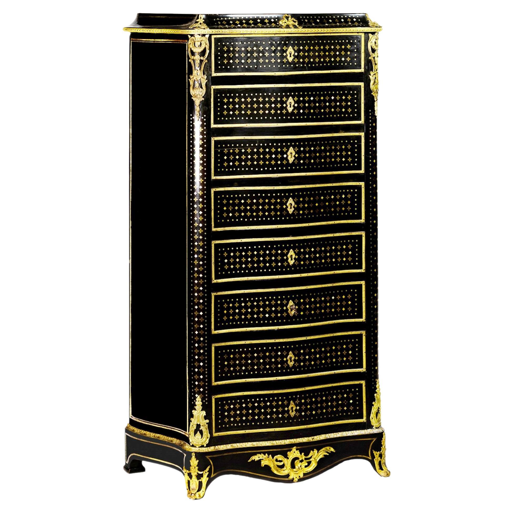 A 19th century French Louis XVI Style Lacquer and Gilded Secretaire with marble top, drop front section. 
Profuse marquetry and five drawer frames and the interior with one drawer in Boulle À La Reine,  holly veneered with inlaid nacre (mother of