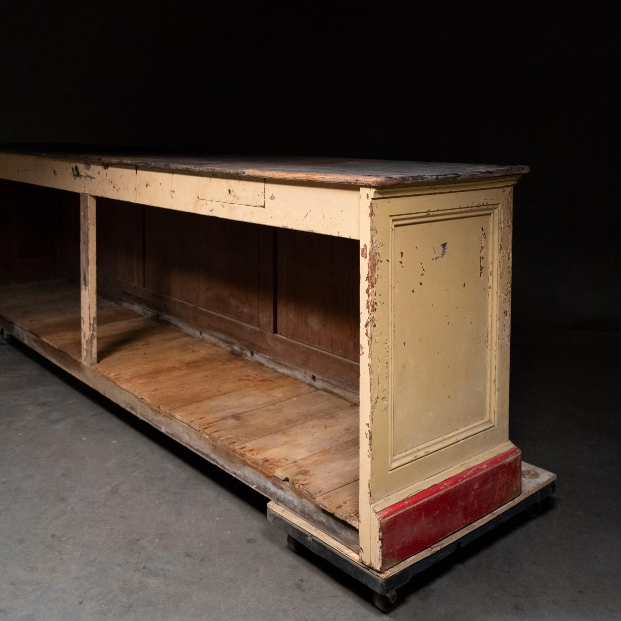 A very nice rare 19th c store counter from France, showing multi panels , tall detailed mouldings work, all in original painted finish . 

Counter has original floor  and small cash drawer .   We left all the finish as us , please feel free to