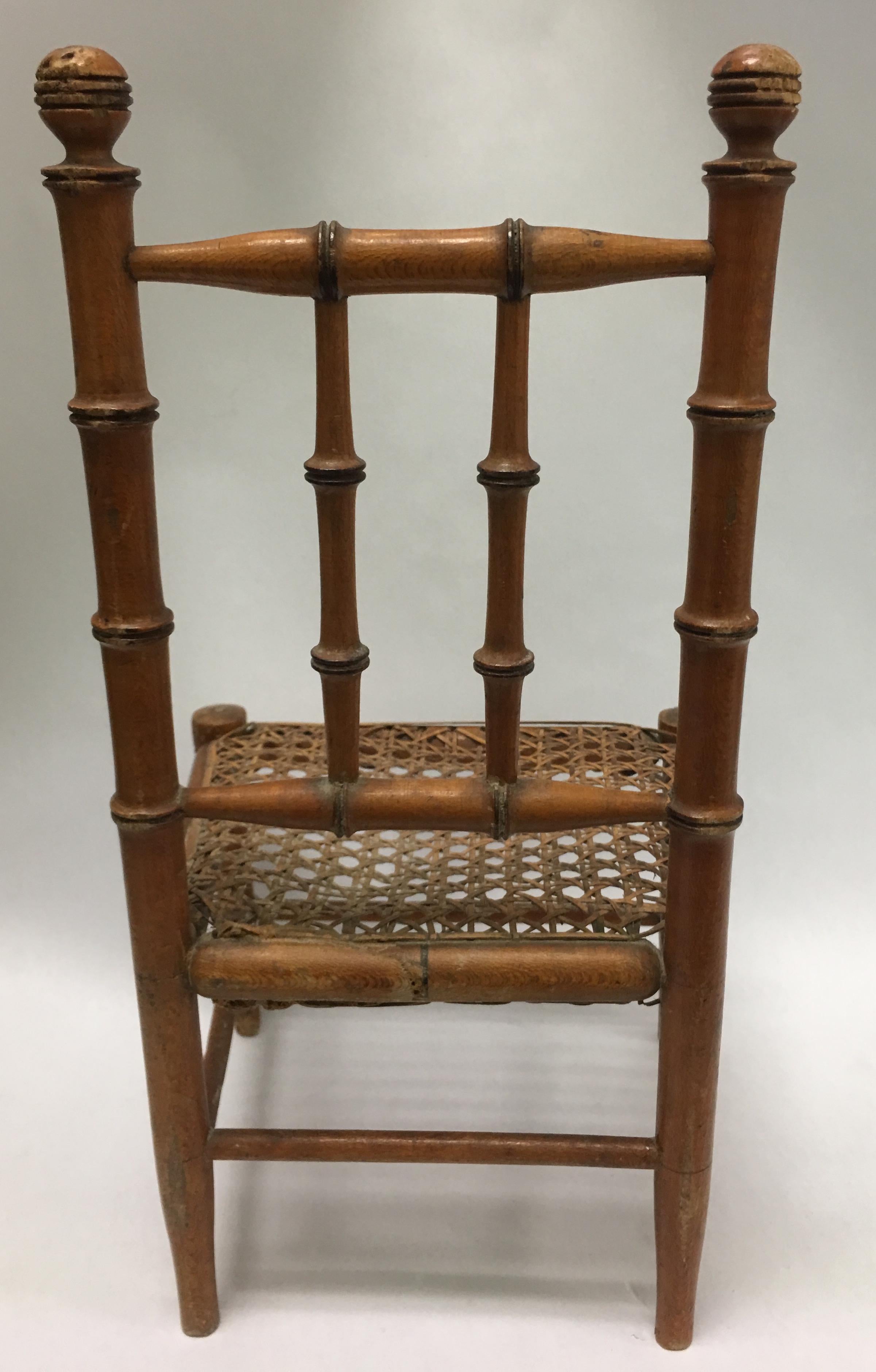 Hand-Carved 19th Century French Miniature Fruitwood Faux Bamboo and Cane Doll Chair