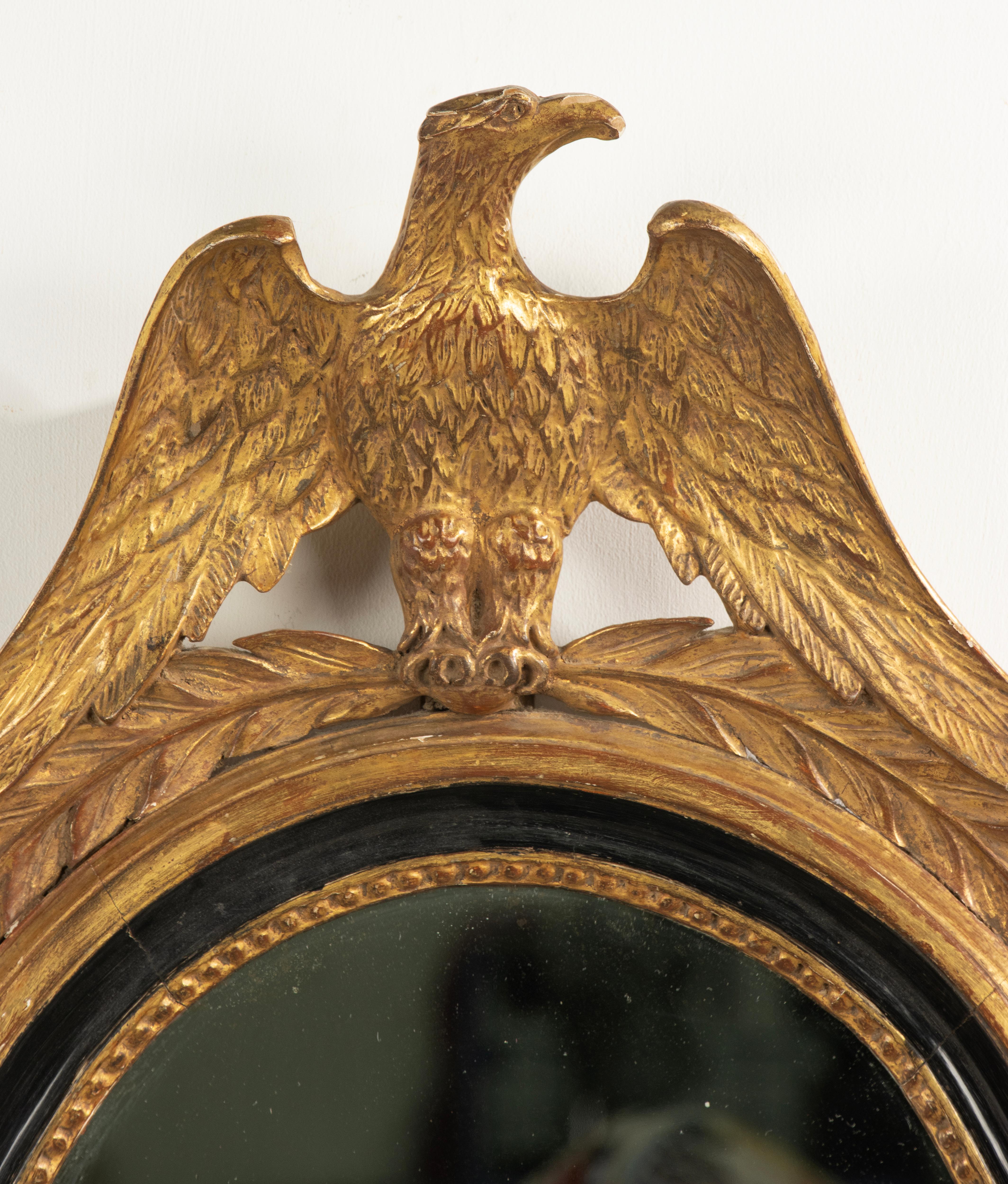Français Miroir français du 19ème siècle, style Empire, doré en vente