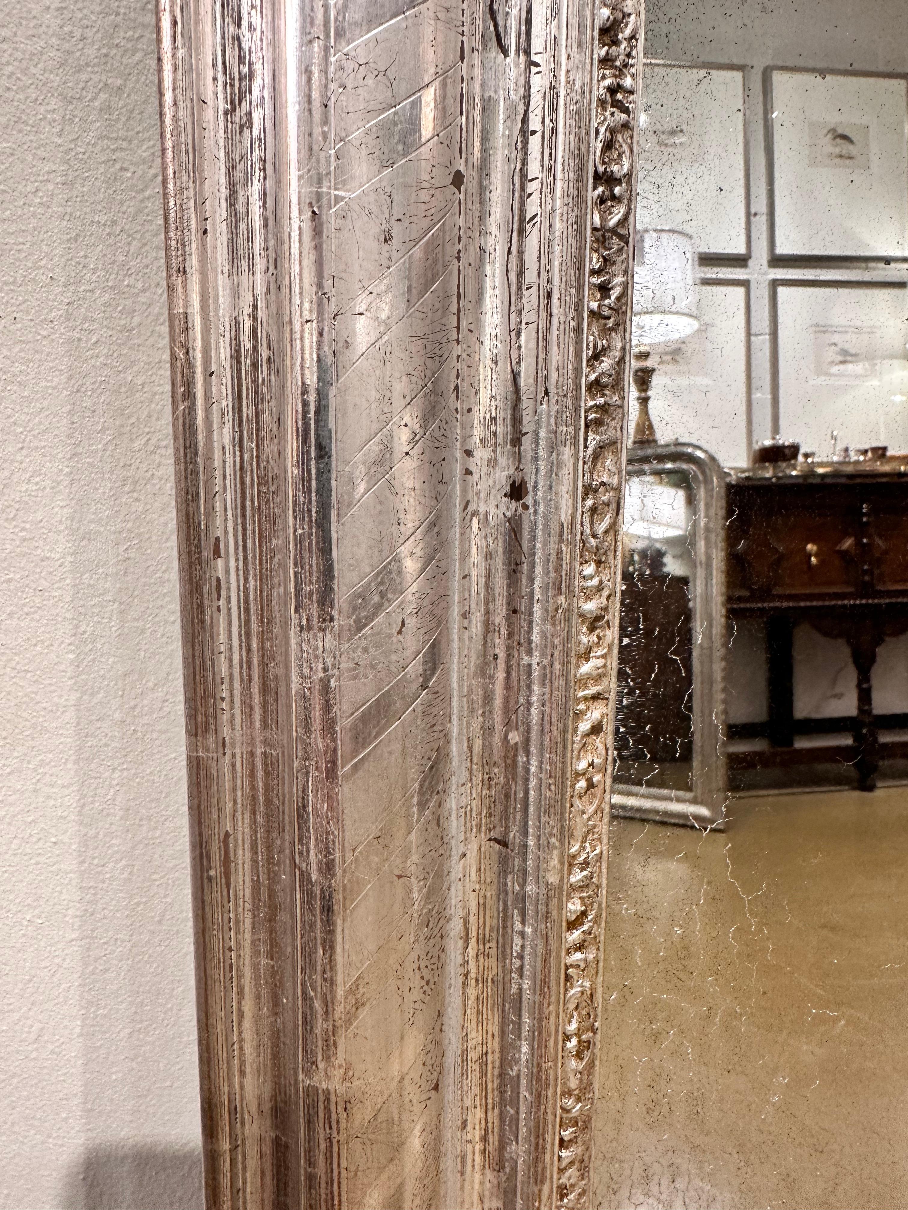 This is a beautiful antique silver Louis Philippe mirror. I’m amazed by every Louis Philippe mirror I see the detail and engraving is just incredible even more amazing I rarely see two a like. #411