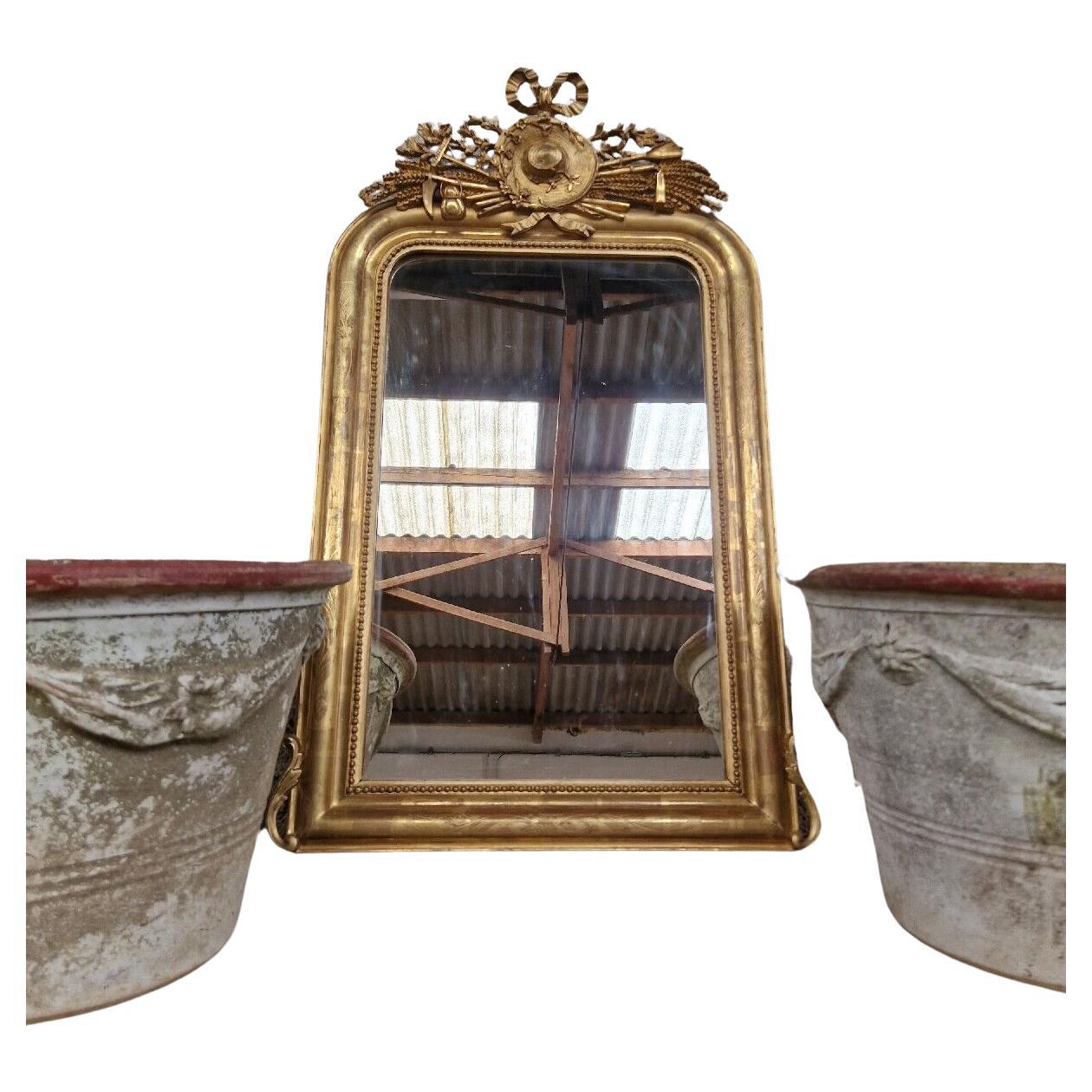 Antique Mirror with Carved Harvest Theme Crest


Fabulous Louis XVI Style

Good Condition

Straw Hat with Barley & Ribbons

Giltwood Frame

Decoration to Surround in Stucco

19th Century

Beautiful Patina


Measurements

140 x 60cm

Listing