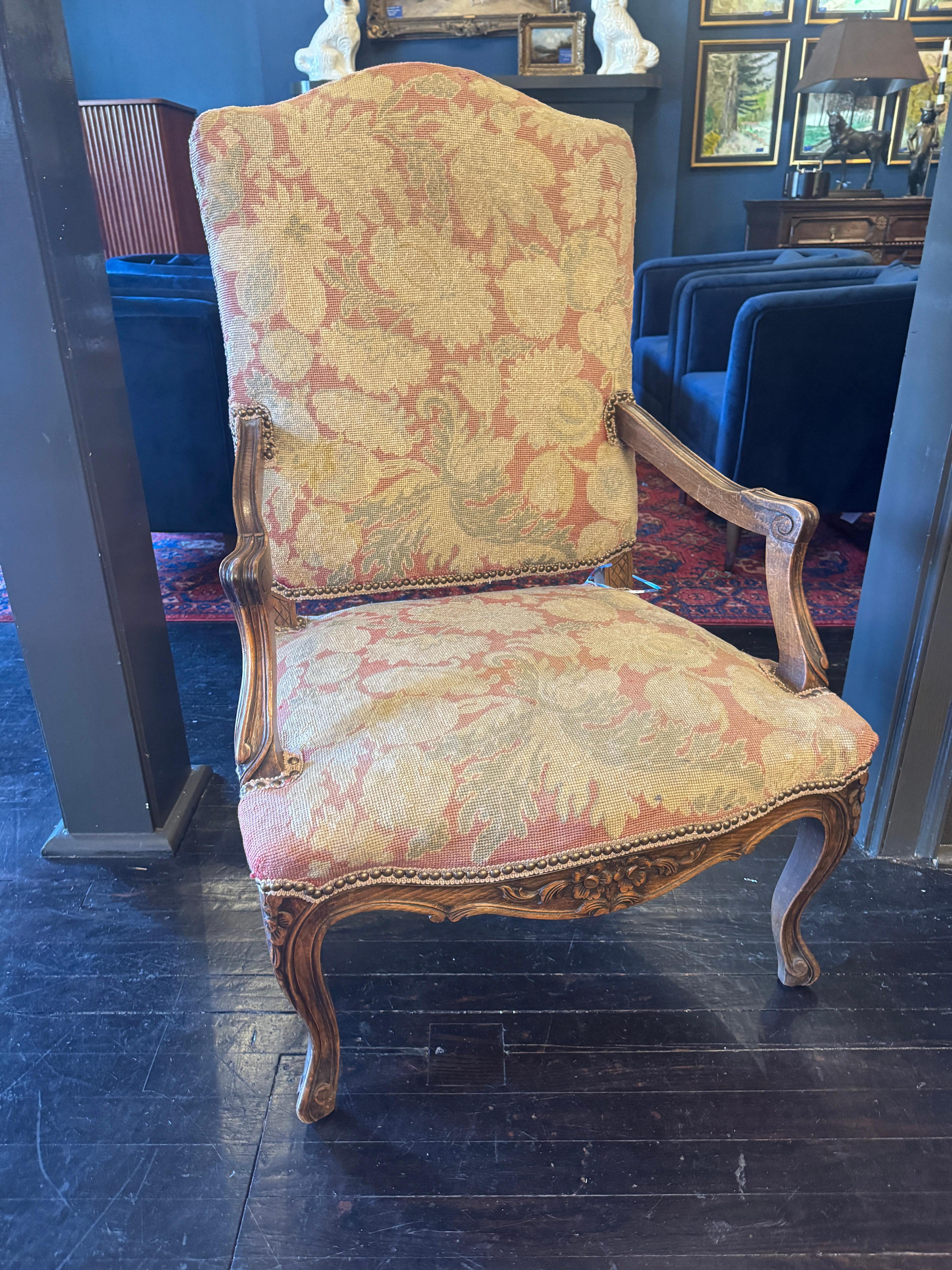 19th Century French Mouton Oak Chair with Needlepoint Upholstery

Lovely chair in the Louis XIV style. The cabriole legs have beautifully carved rosettes with compliments the floral motif of the needlepoint upholstery. France, 19th