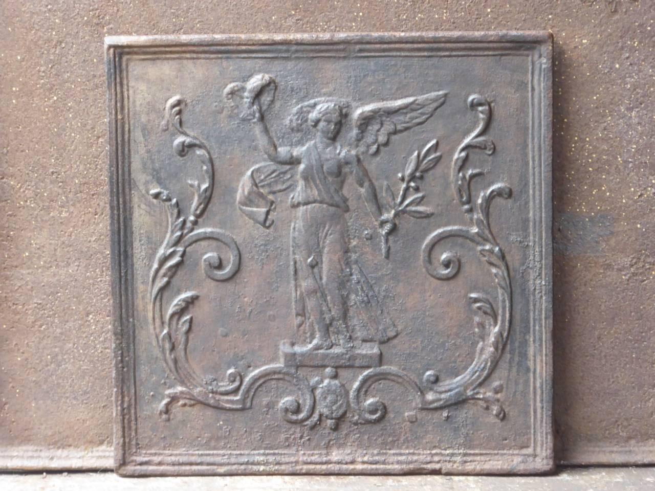 19th century French Napoleon III fireback with an allegory of Peace. The Allegory of Peace is holding an olive branche, symbol for peace and a laurel wreath, symbol for victory, in her hands.

We have a unique and specialized collection of antique