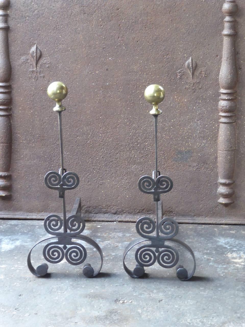 19th century French Napoleon III andirons made of wrought iron and brass.