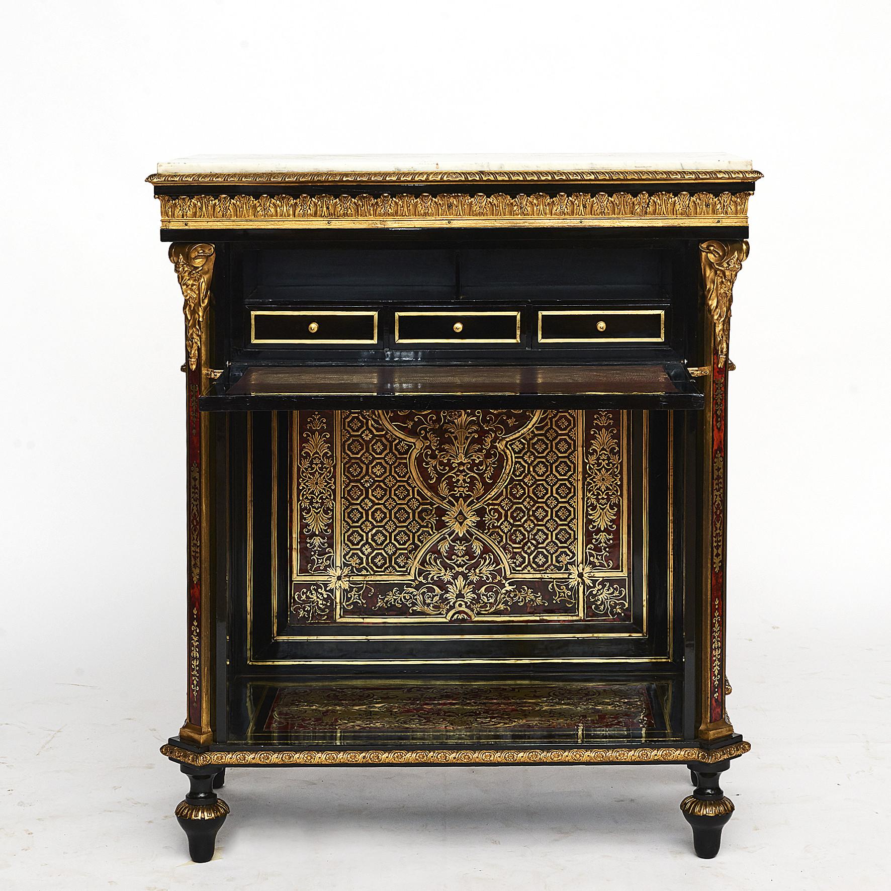 19th century French Napoleon III console table.
Ebonized pear-tree wood with Boulle style red-orange tortoiseshell and brass Marquetry, ormolu detailing and marble top. The detailed and interconnected designs include figures of monkeys, birds and