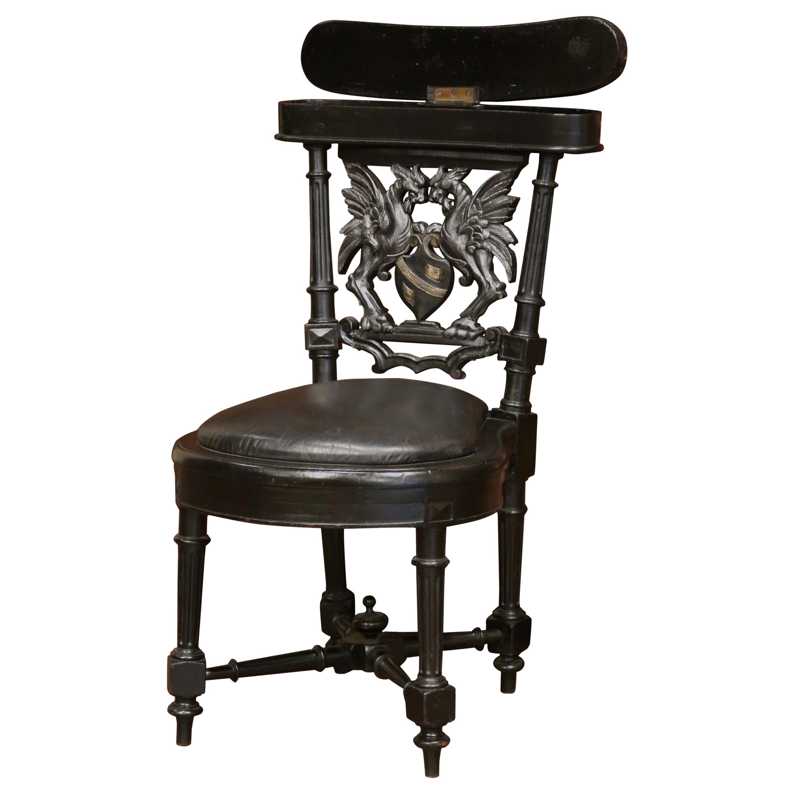 19th Century French Napoleon III Carved Ebonized Cigar Chair with Leather Top