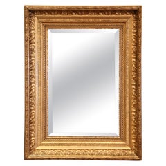 Specchio da parete francese Napoleone III del XIX secolo in legno dorato intagliato e vetro smussato