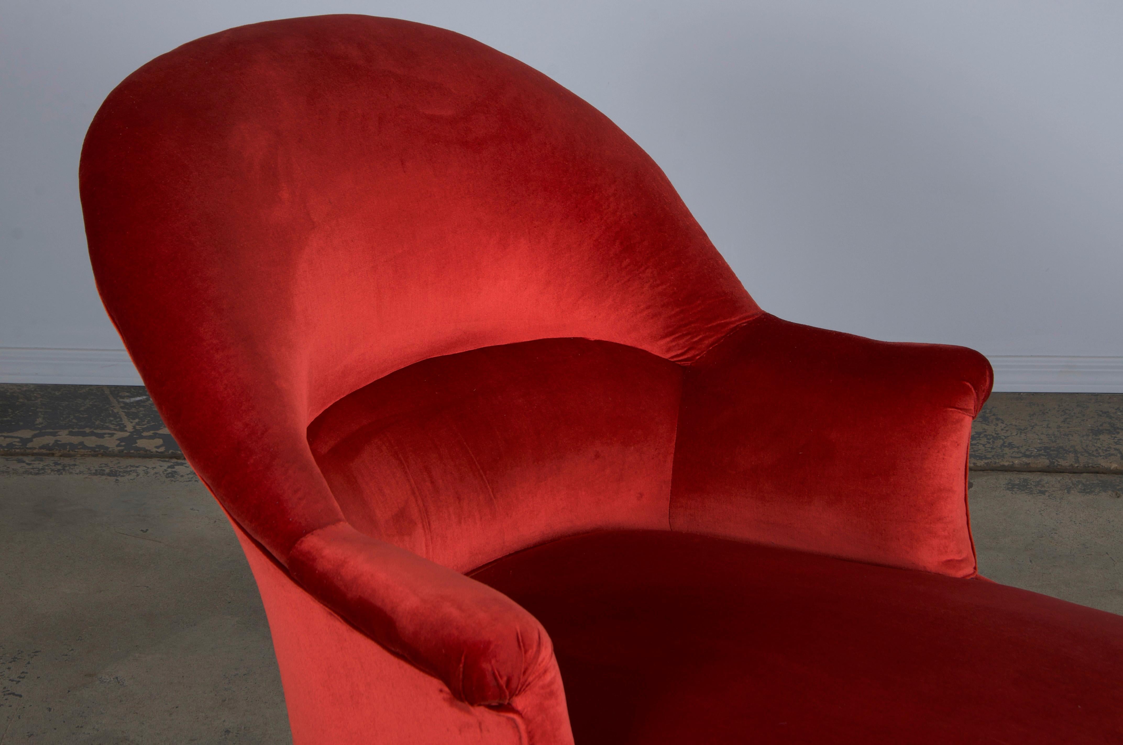 A traditional late 19th-century Napoleon III chaise or daybed lounge sourced from Provence, France. Beautifully handcrafted from solid wood, it features elegant oval-back frames with scroll arms. Structurally restored, the chaise retains its