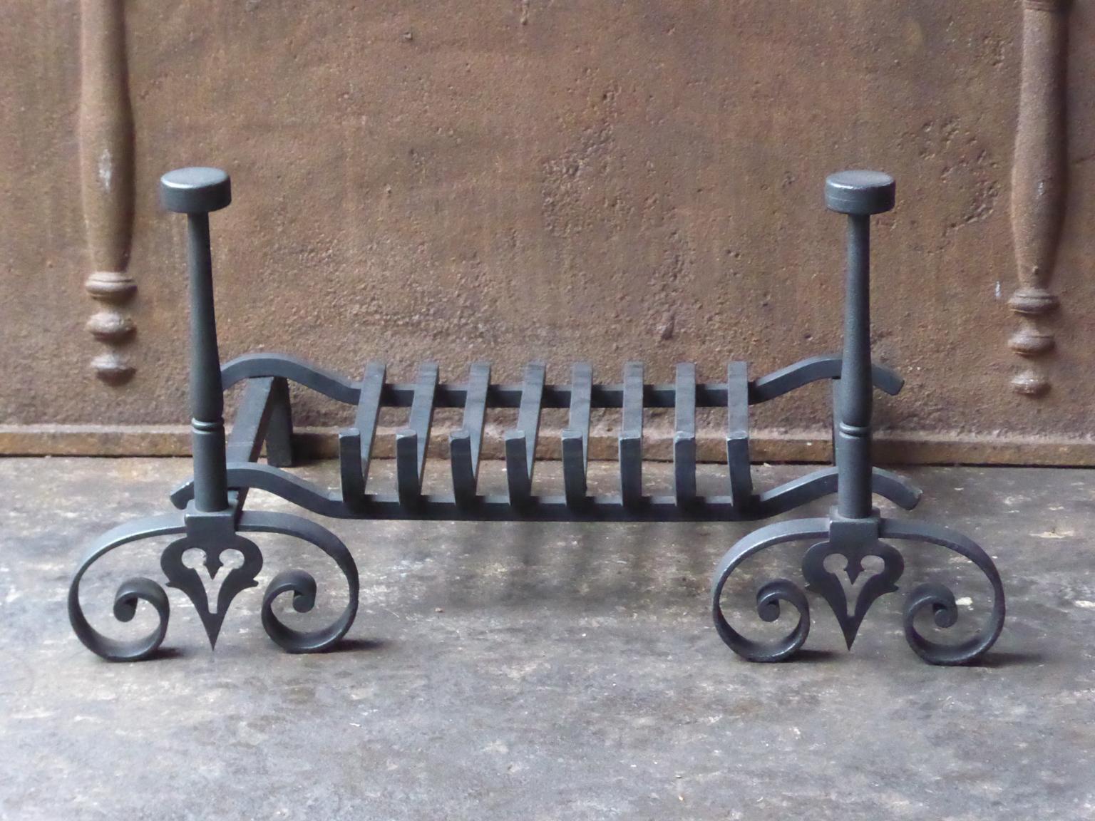 19th century French Napoleon III fireplace basket, fire basket made of wrought iron. The basket is in a good condition and is fully functional. The total width of the front of the grate is 64.5 cm (25.4 inch).