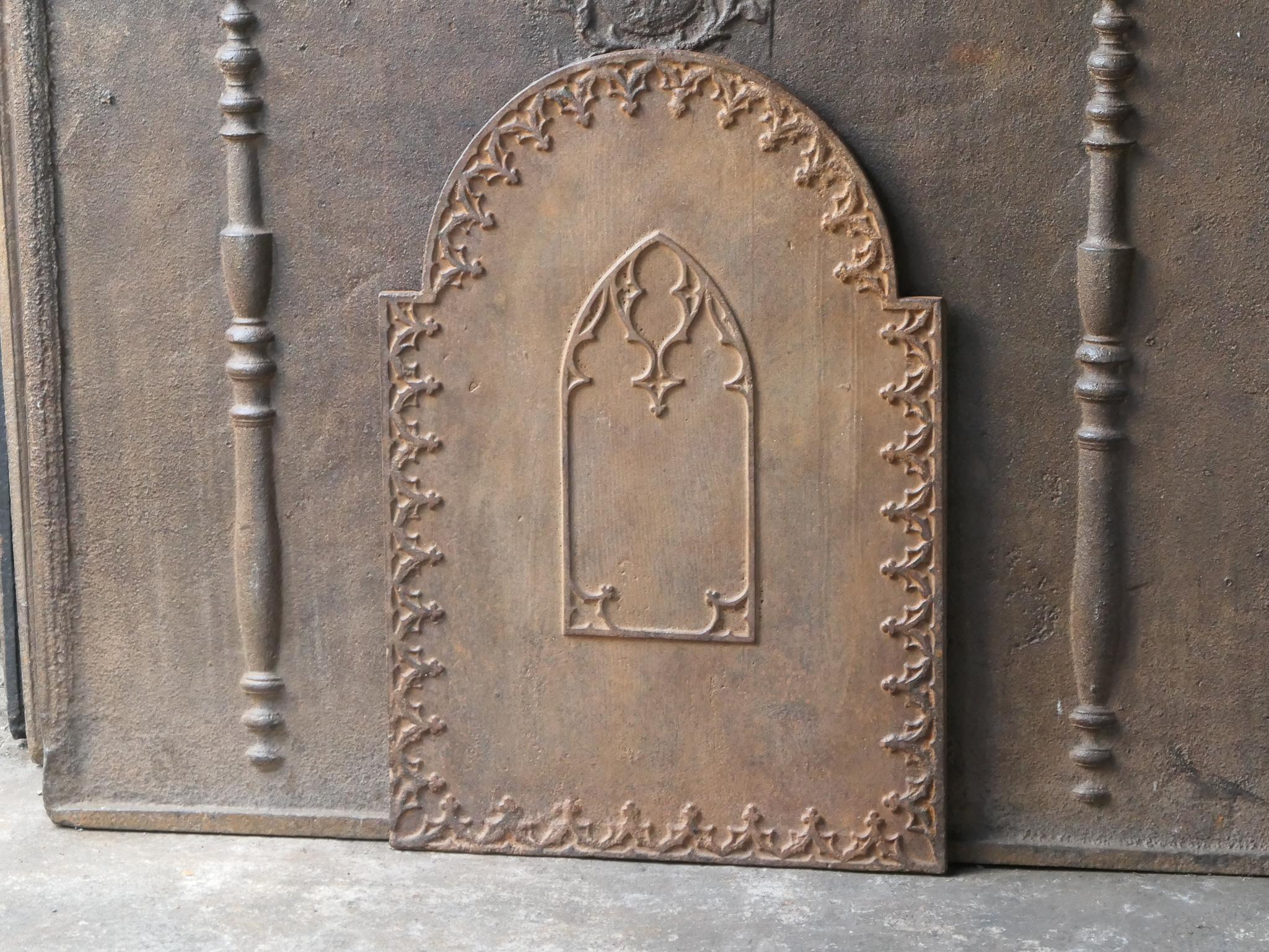 19th Century Napoleon III period fireback. The fireback is made of cast iron and has a natural brown patina. Upon request it can be made black / pewter at no extra cost. It is in a good condition and does not have cracks.