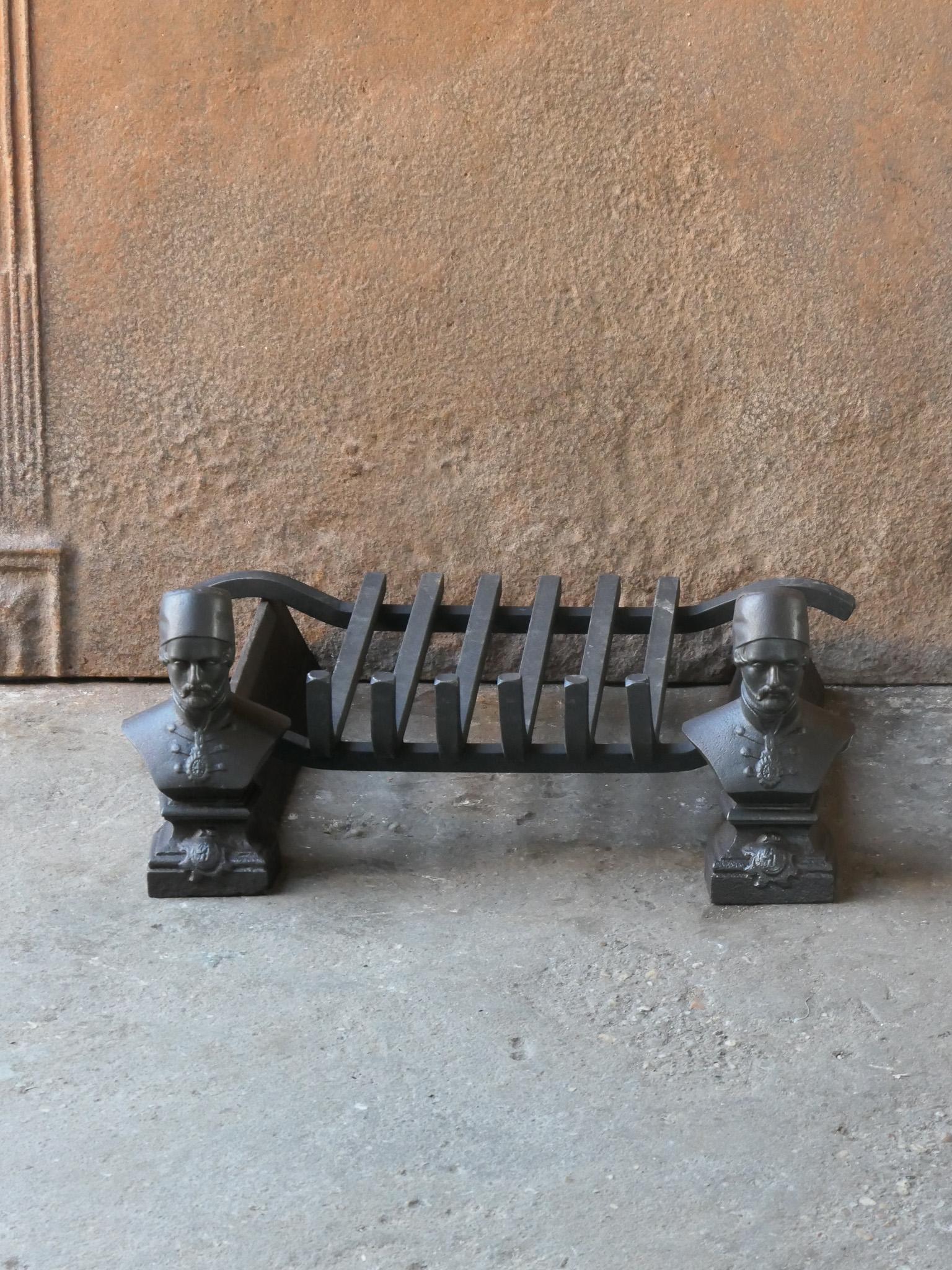 19th century French Napoleon III fireplace grate. The andirons are made of cast iron and the grate of steel. The grate is in a good condition and is fully functional.