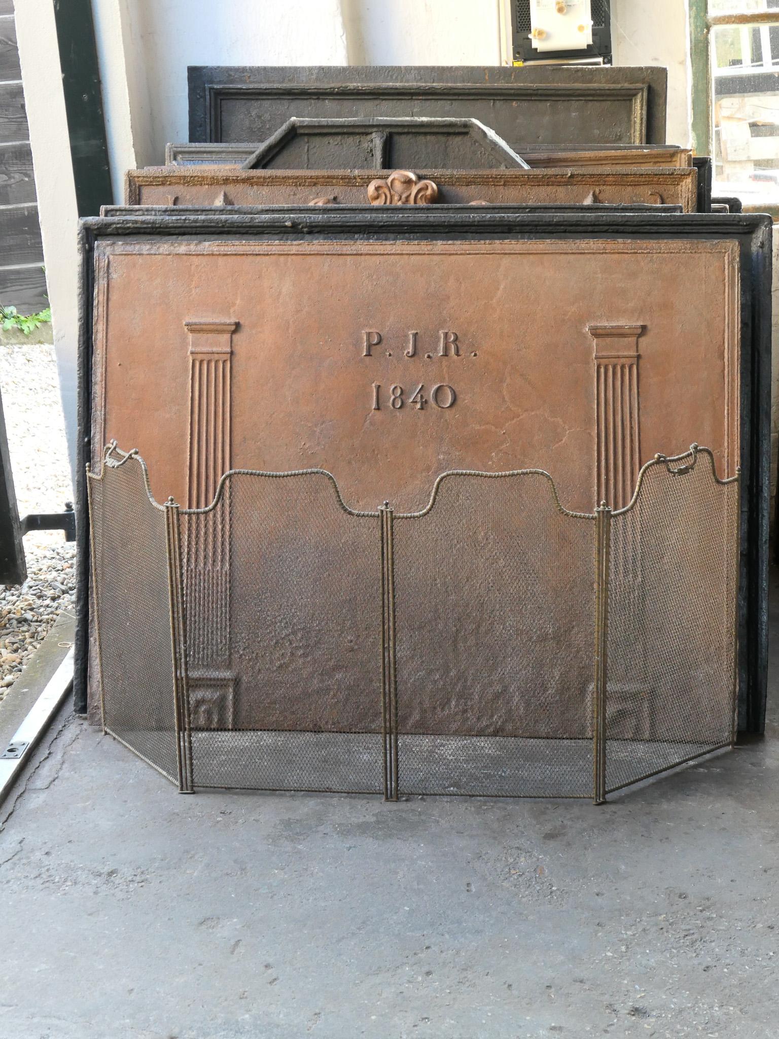 19th century French Napoleon III three-panel fireplace screen. The screen is made of brass, iron and iron mesh and has a brown color. It is in a good condition and is fit for use in front of the fireplace.