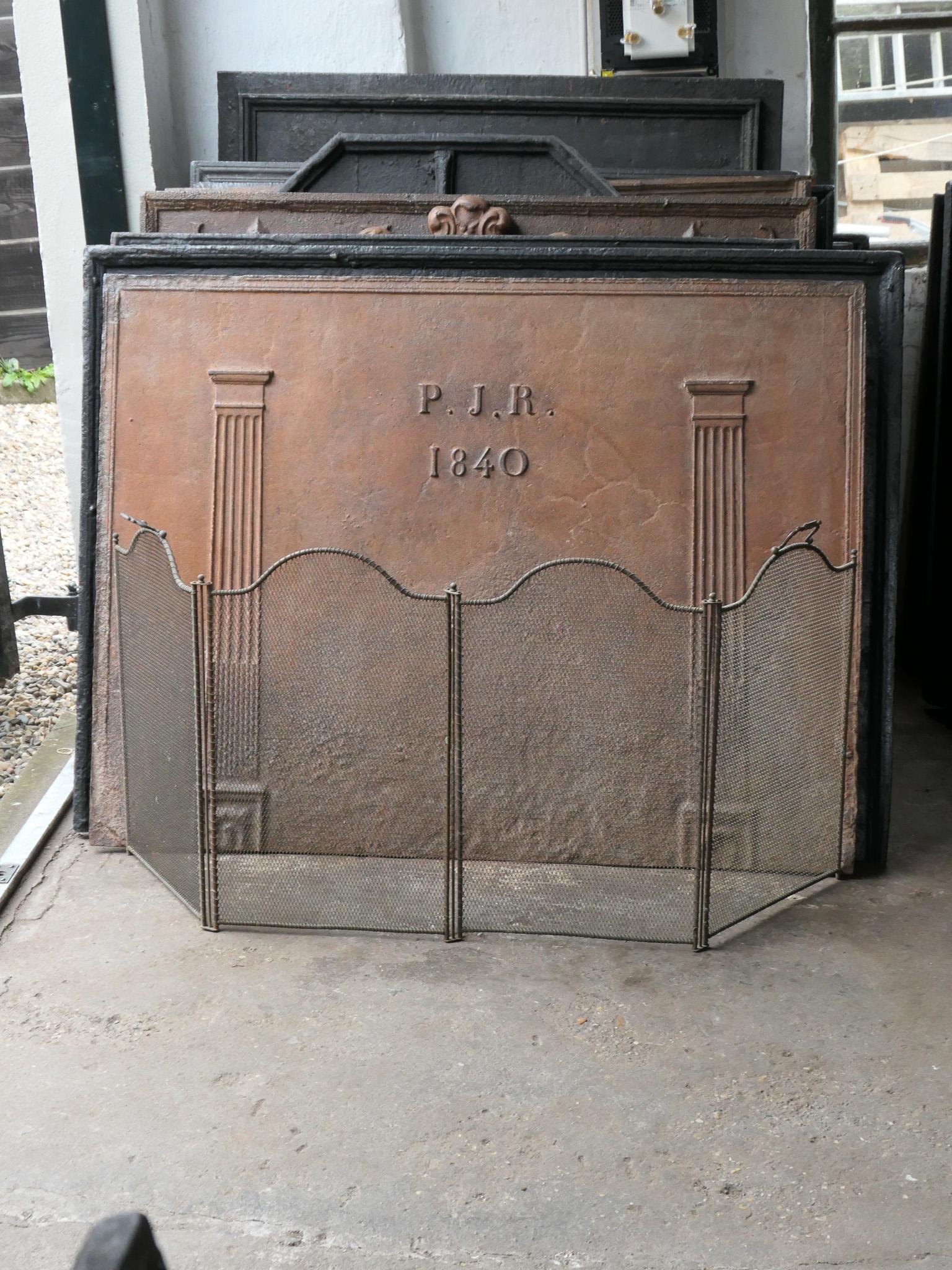 19th century French Napoleon III three-panel fireplace screen. The screen is made of brass, iron and iron mesh and has a brown color. It is in a good condition and is fit for use in front of the fireplace.