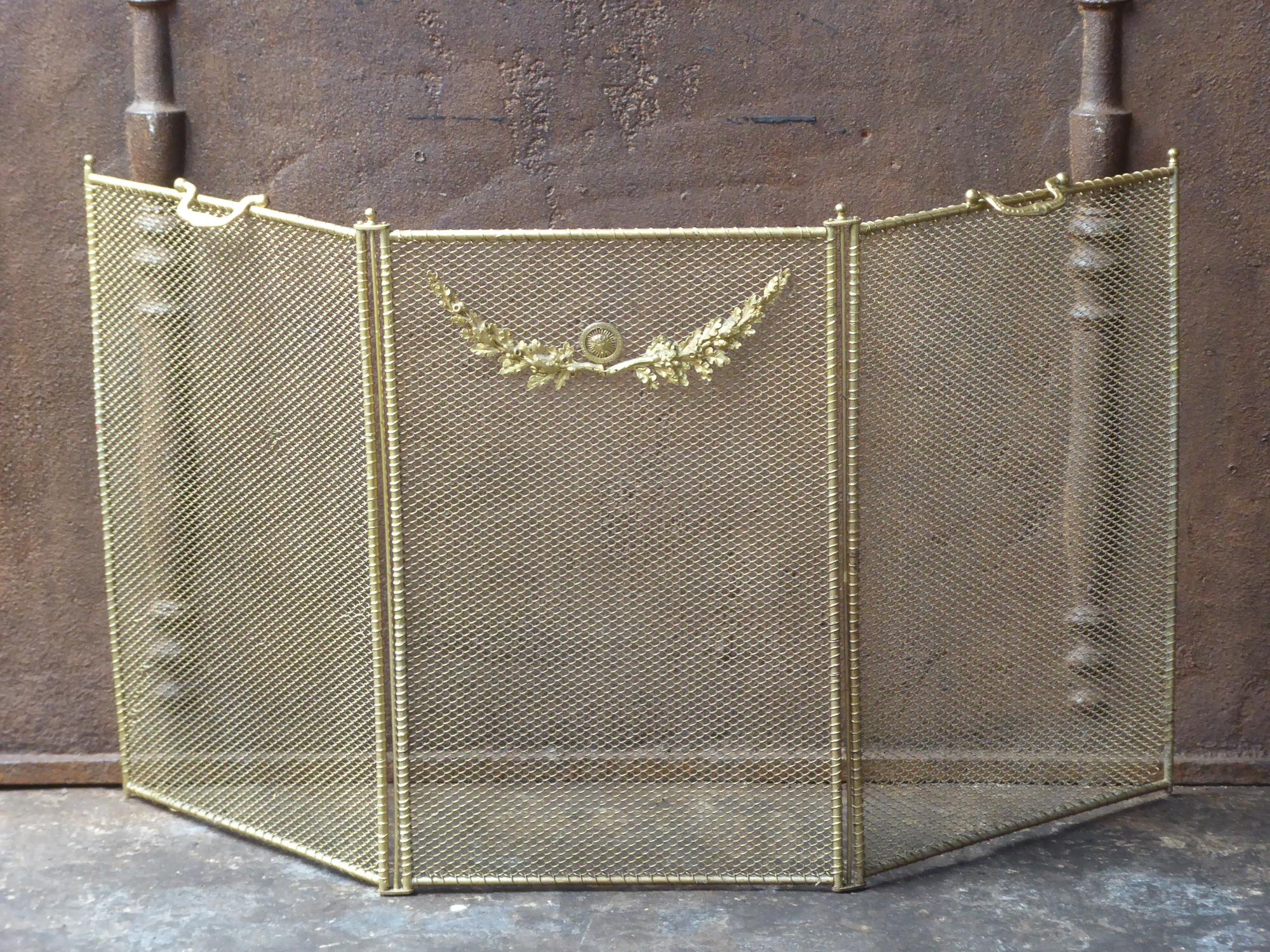 19th century French Napoleon III fireplace screen made of iron and iron mesh.







