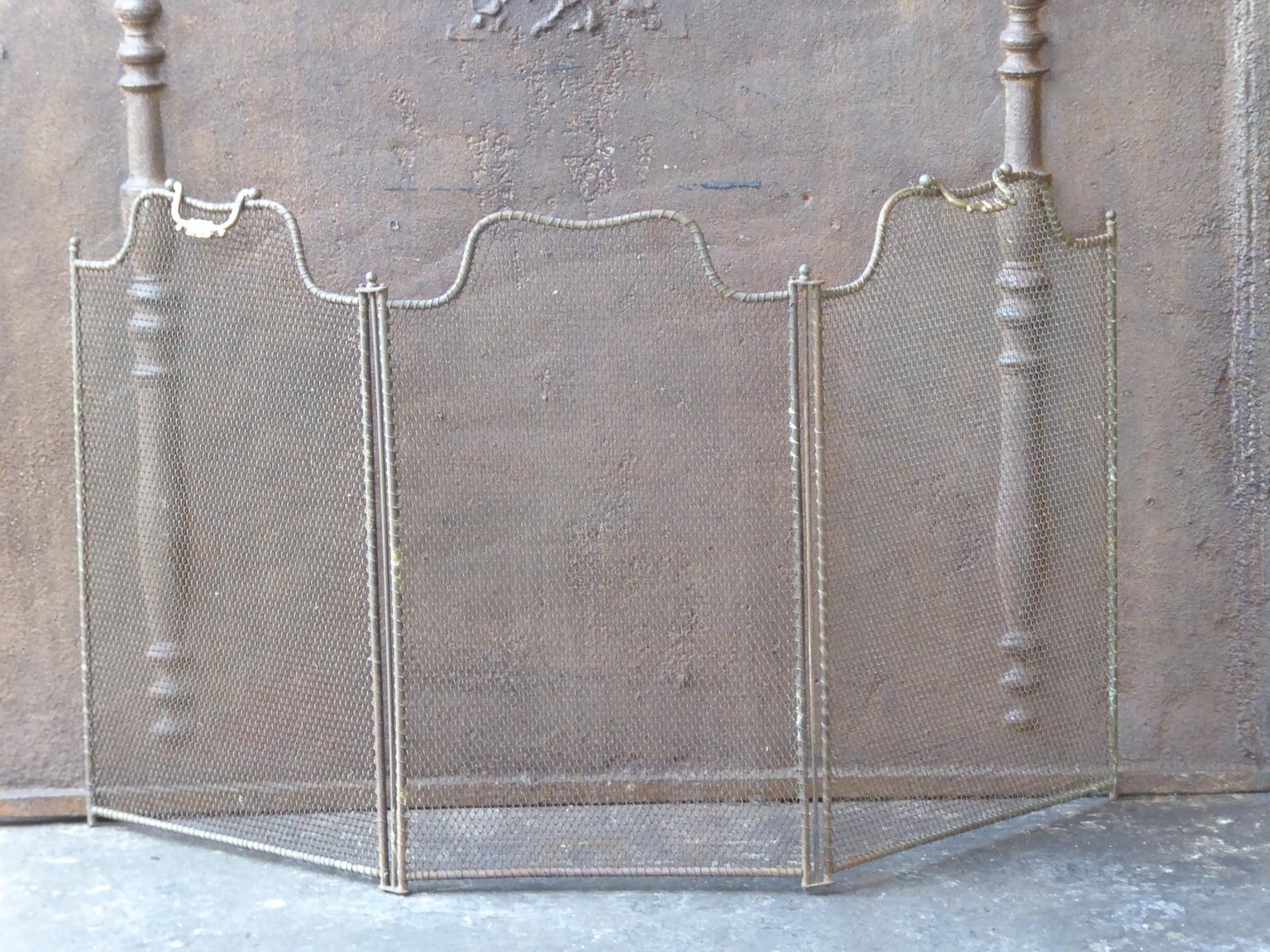 19th century French Napoleon III three panel fireplace screen. The screen is made of brass and iron mesh. It is in a good condition and is fit for use in front of the fireplace.