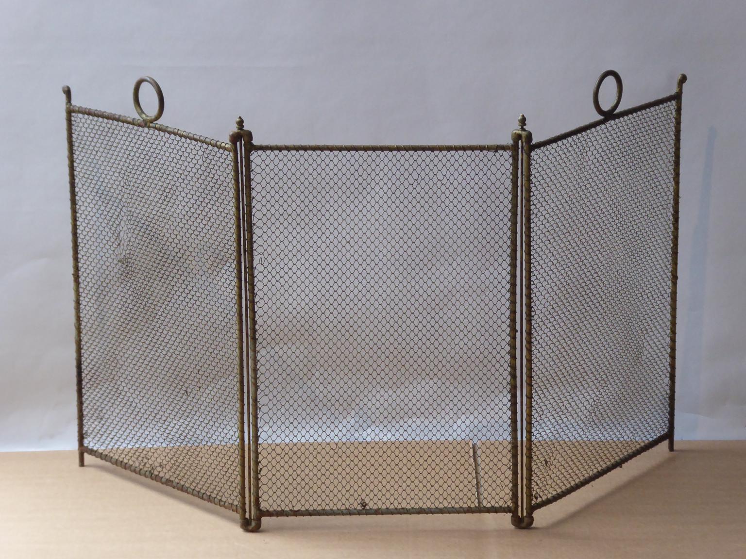 19th century French Napoleon III three panel fireplace screen. The screen is made of iron and iron mesh. It is in a good condition and is fit for use in front of the fireplace.