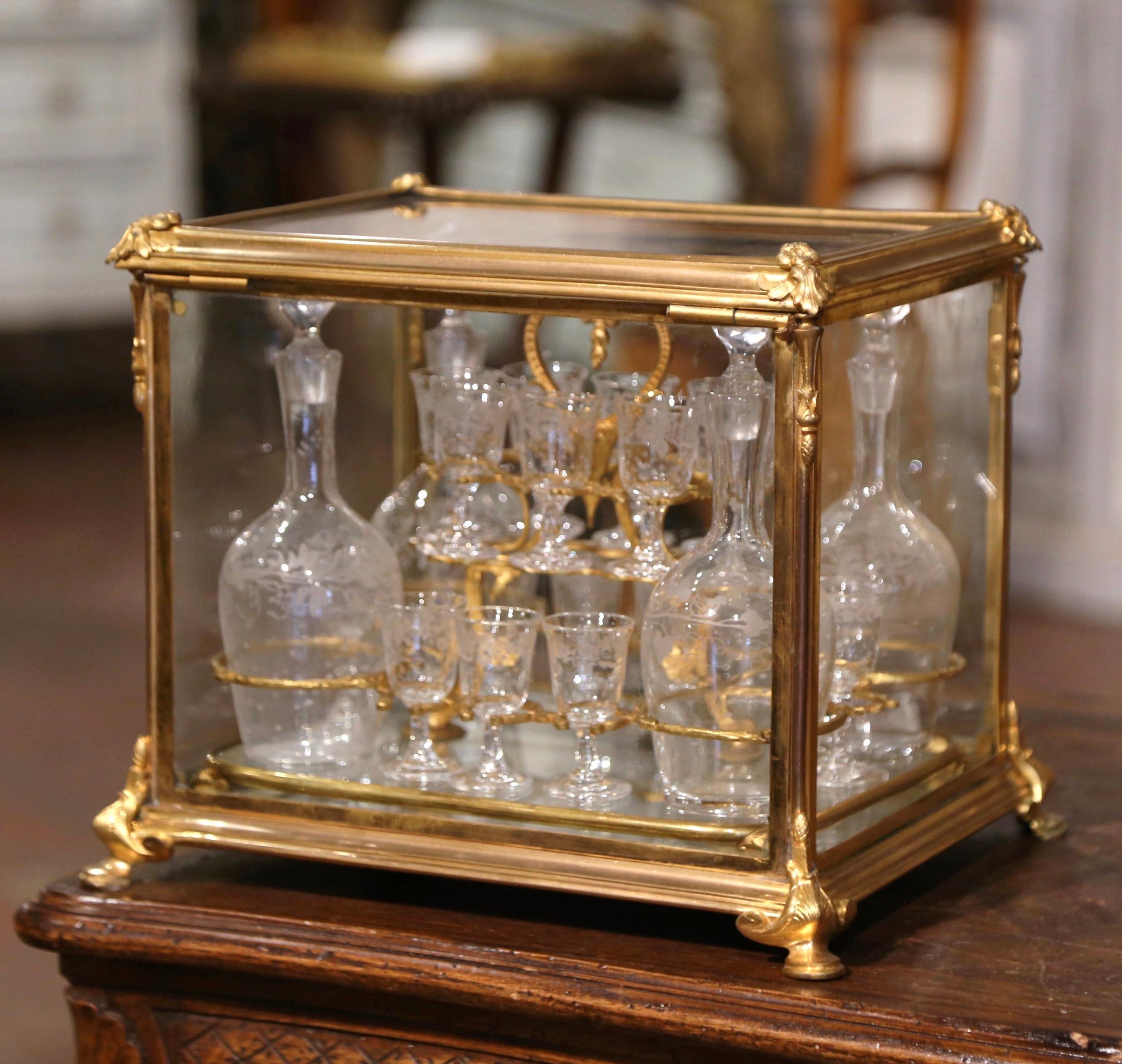 Create a bar area with this elegant antique cave à liqueur. Created in France circa 1870 and built of bronze with floral decor in each corner, the decorative liquor box stands on curved feet decorated with acanthus leaf motifs. The bar essential is