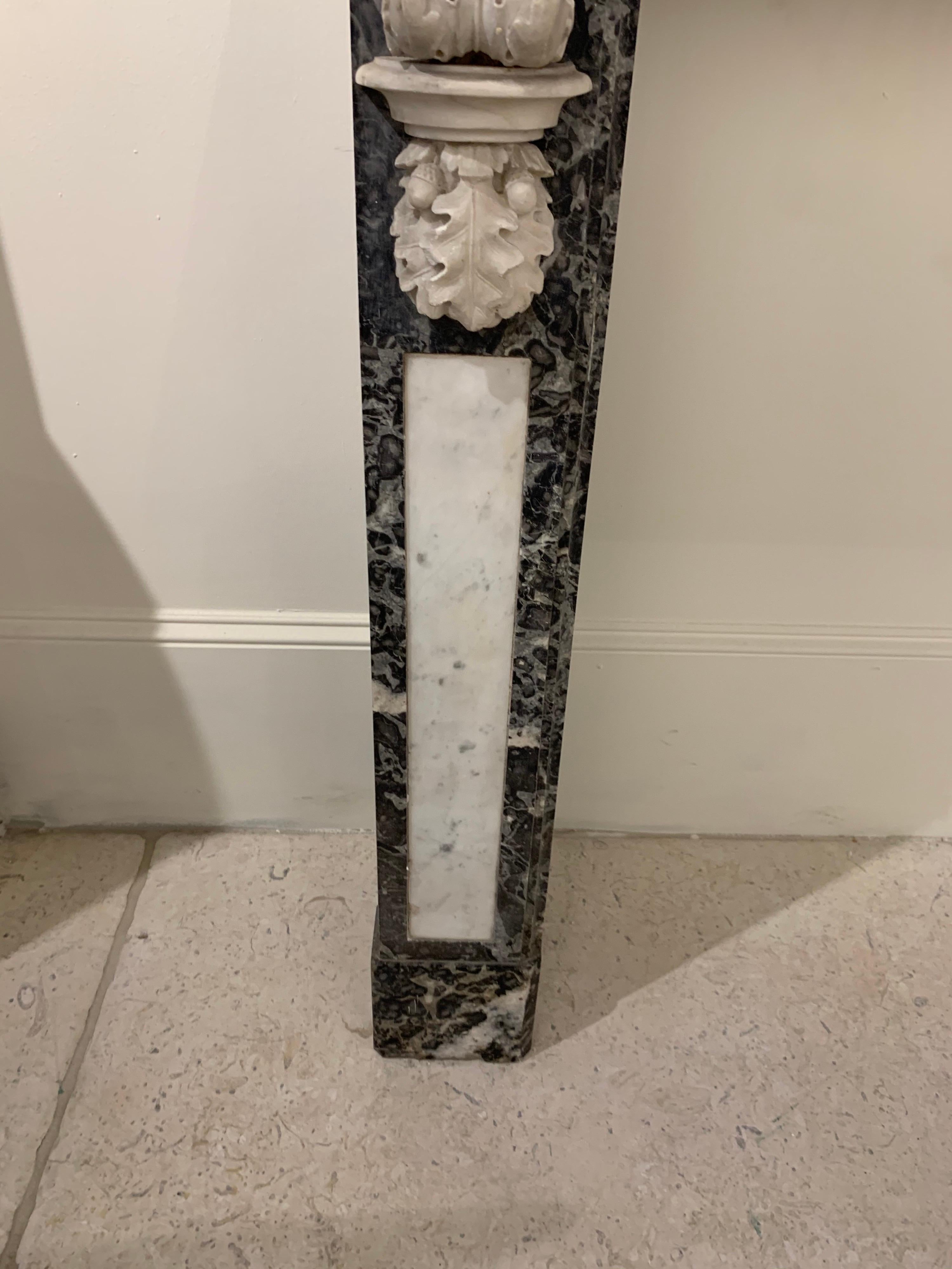 Fabulous 19th century French Napoleon III marble and gilt bronze fire place mantel. Beautiful grey and white marble along with lovely carvings. Extra special!