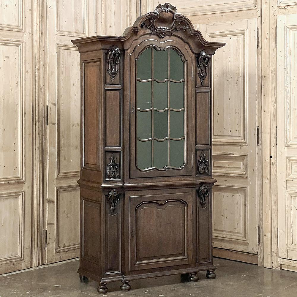 19th Century French Napoleon III Period Louis XIV Bookcase is a masterpiece of the genre, with bold styling creating a magnificent presence for any setting!  The amazing triple arched crown provides an impressive three dimensionality overlooking the