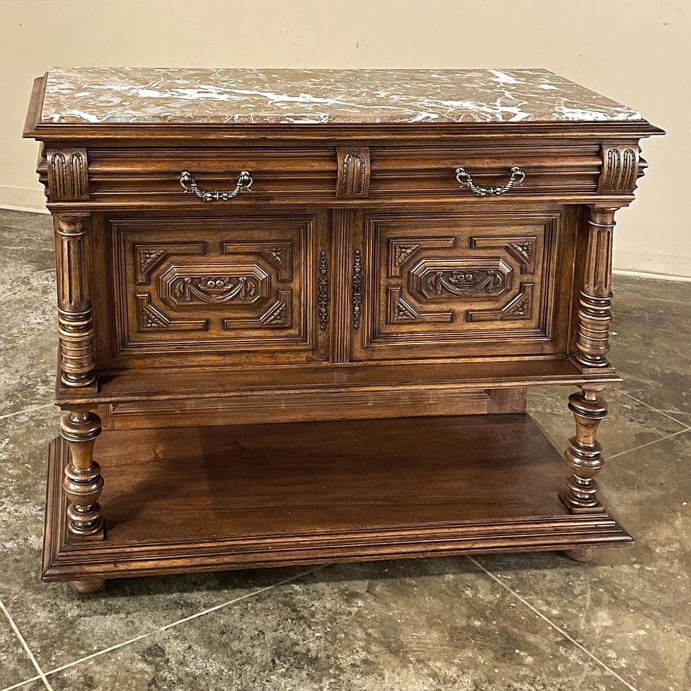 19th Century French Neoclassical Henri II marble top walnut buffet will make a great addition to any room, for a wide variety of purposes, and do it in style! The luxuriously veined marble top catches the eye immediately, providing a carefree yet