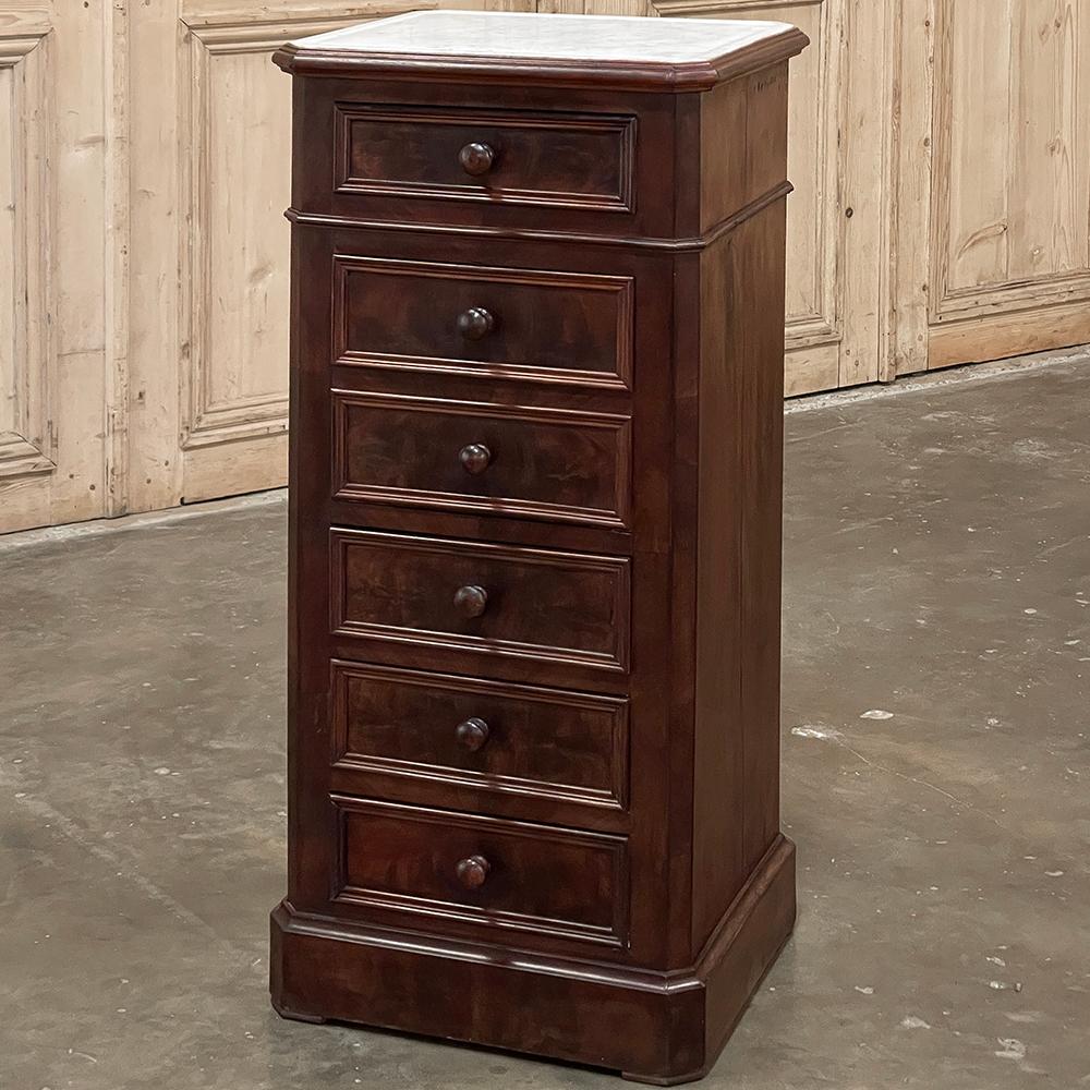 19th Century French Neoclassical Louis XVI Mahogany Nightstand with Carrara Marble is an extraordinary example of the finest materials and craftsmanship being combined to produce an instant family heirloom.  Exotic imported mahogany was used for the