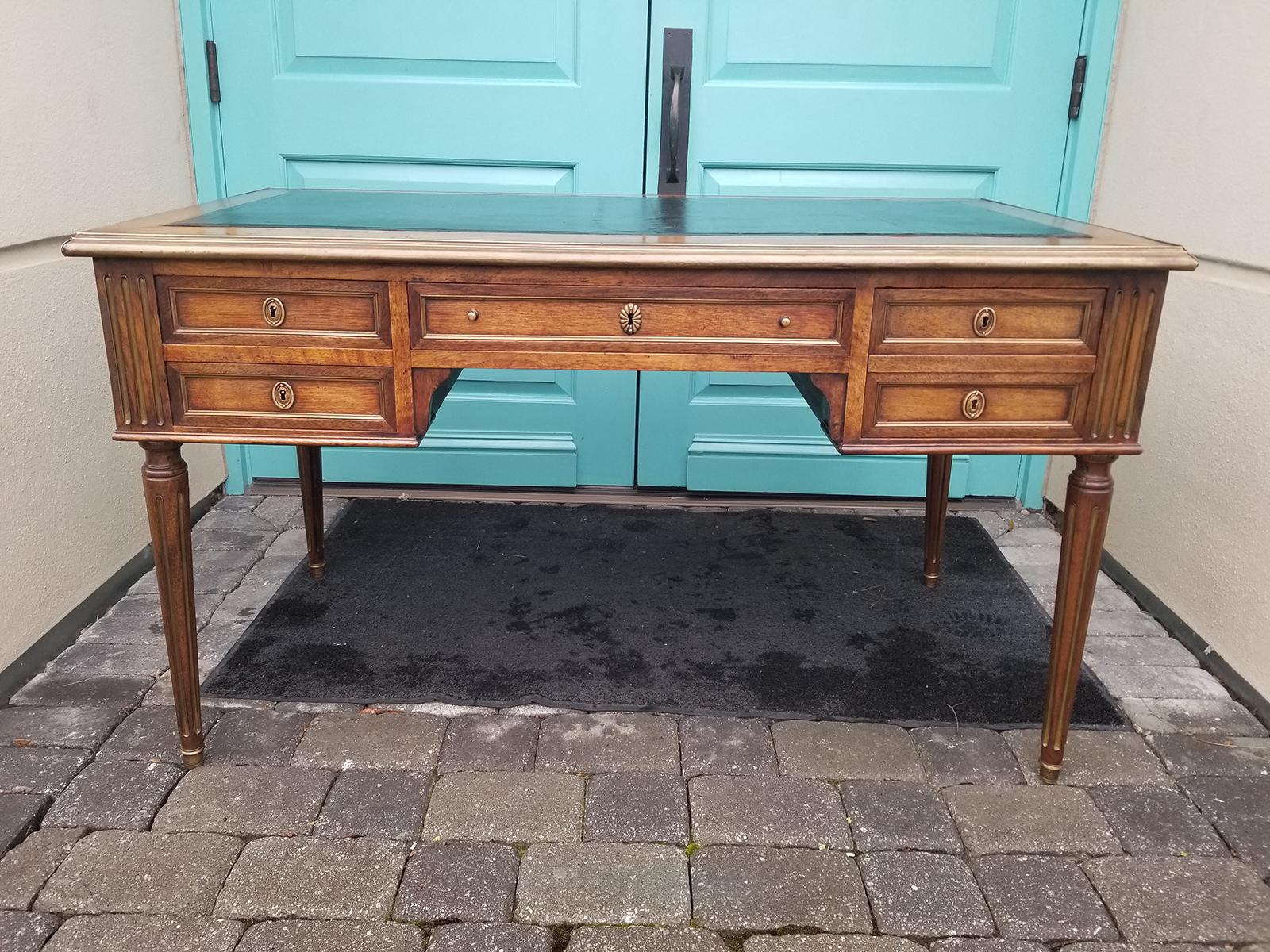 19th century French neoclassical Louis XVI style desk with bronze trim, black leather top, and two writing slides
Classic form,
circa 1860-1880s
Measures: 51