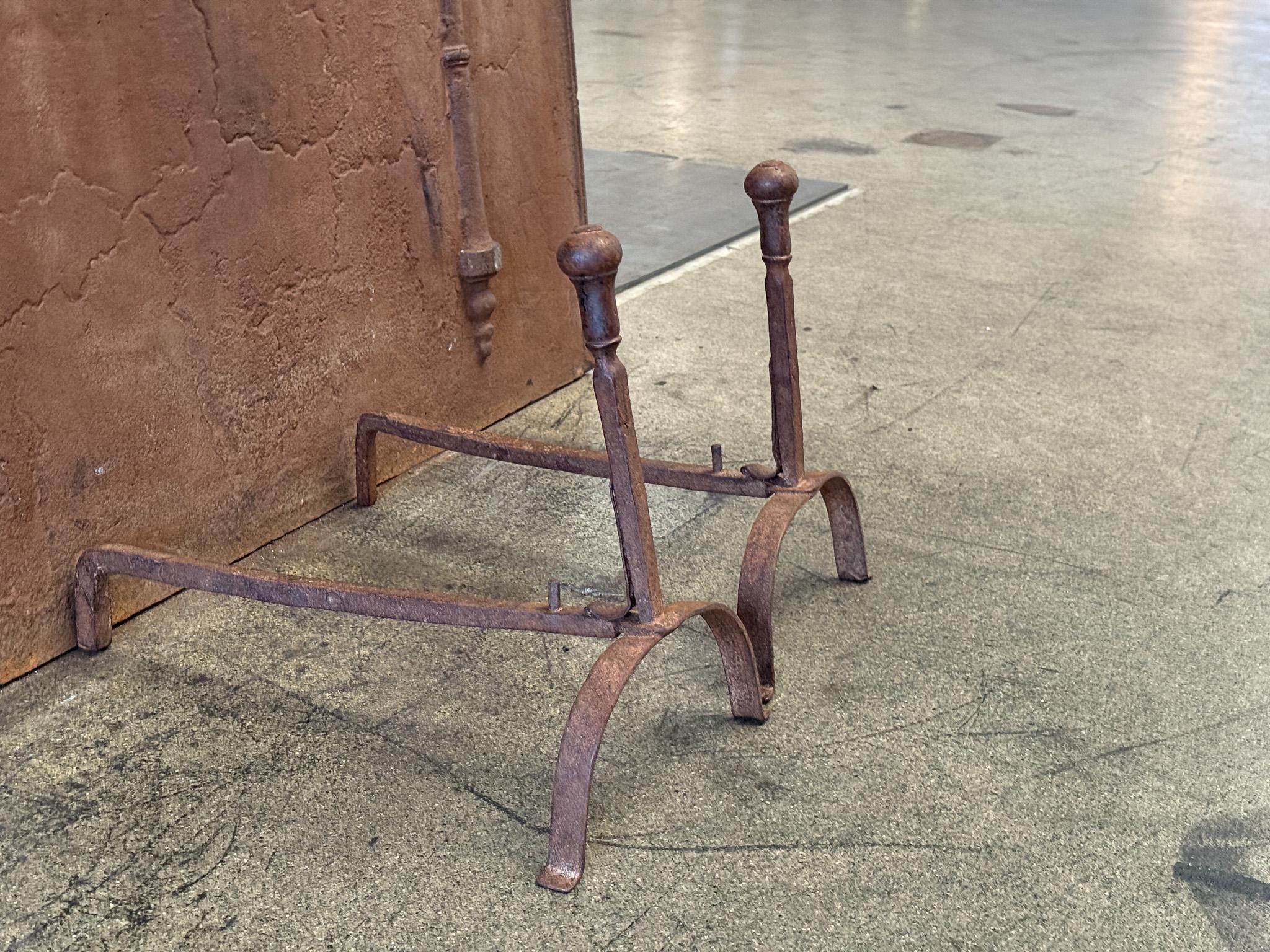 19th century French Neoclassical Period andirons made of wrought iron. The condition is good.