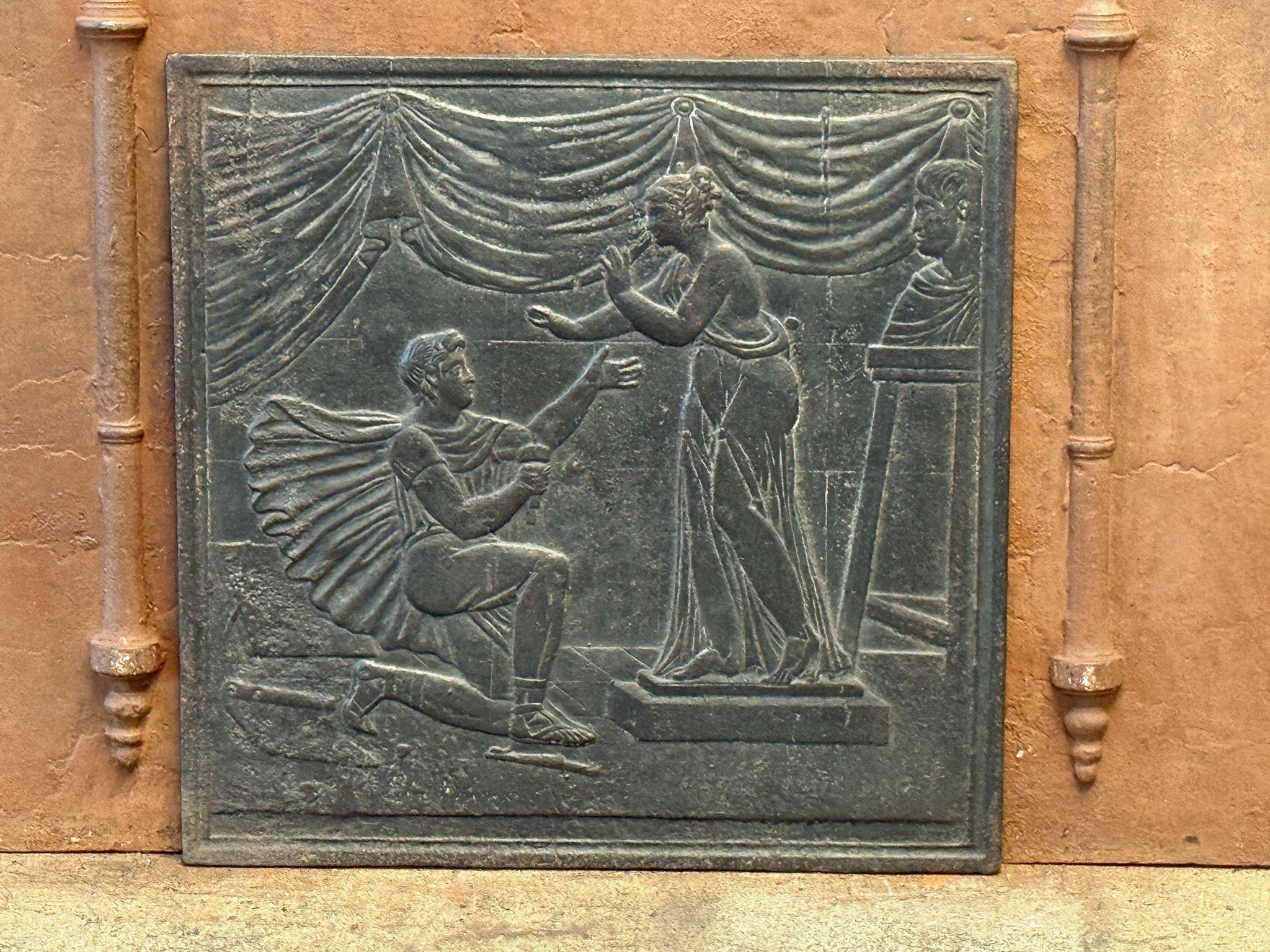 19th century French neoclassical period fireback. The fireback is made of cast iron and has a natural brown patina. Upon request, it can be made black or pewter. It is in good condition, without cracks.