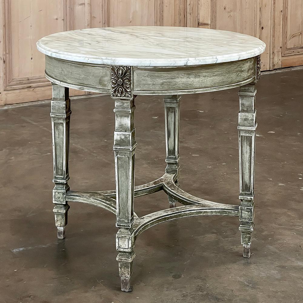 19th century French Neoclassical Round Painted End Table with carrara Marble Top is the perfect choice for making an impressive style statement without being pretentious. Called a gueridon in France, it has been handcrafted from solid fruitwood by