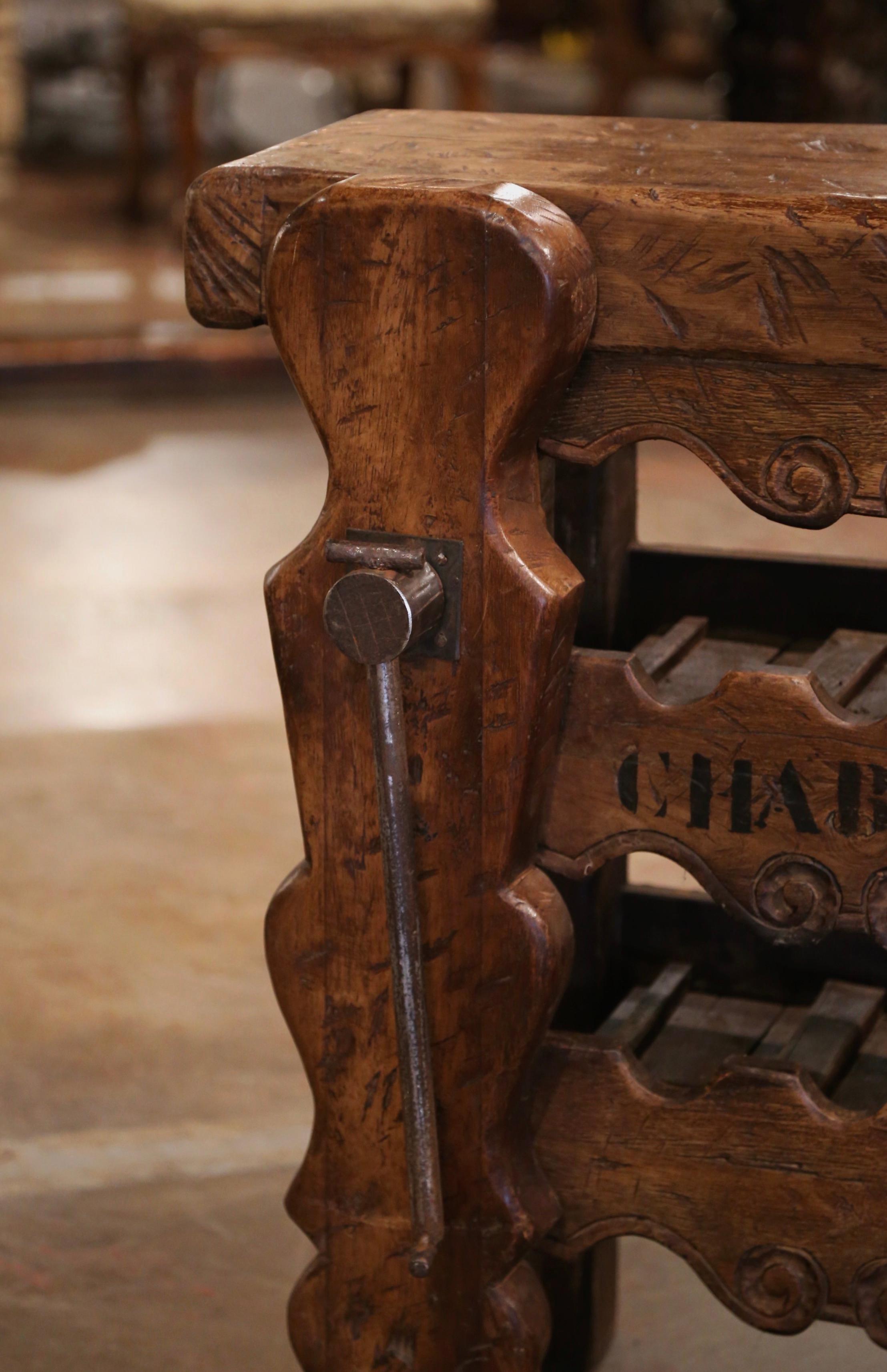 Hand-Carved 19th Century French Oak Carpenter Press Table with Six-Bottle Storage Rack