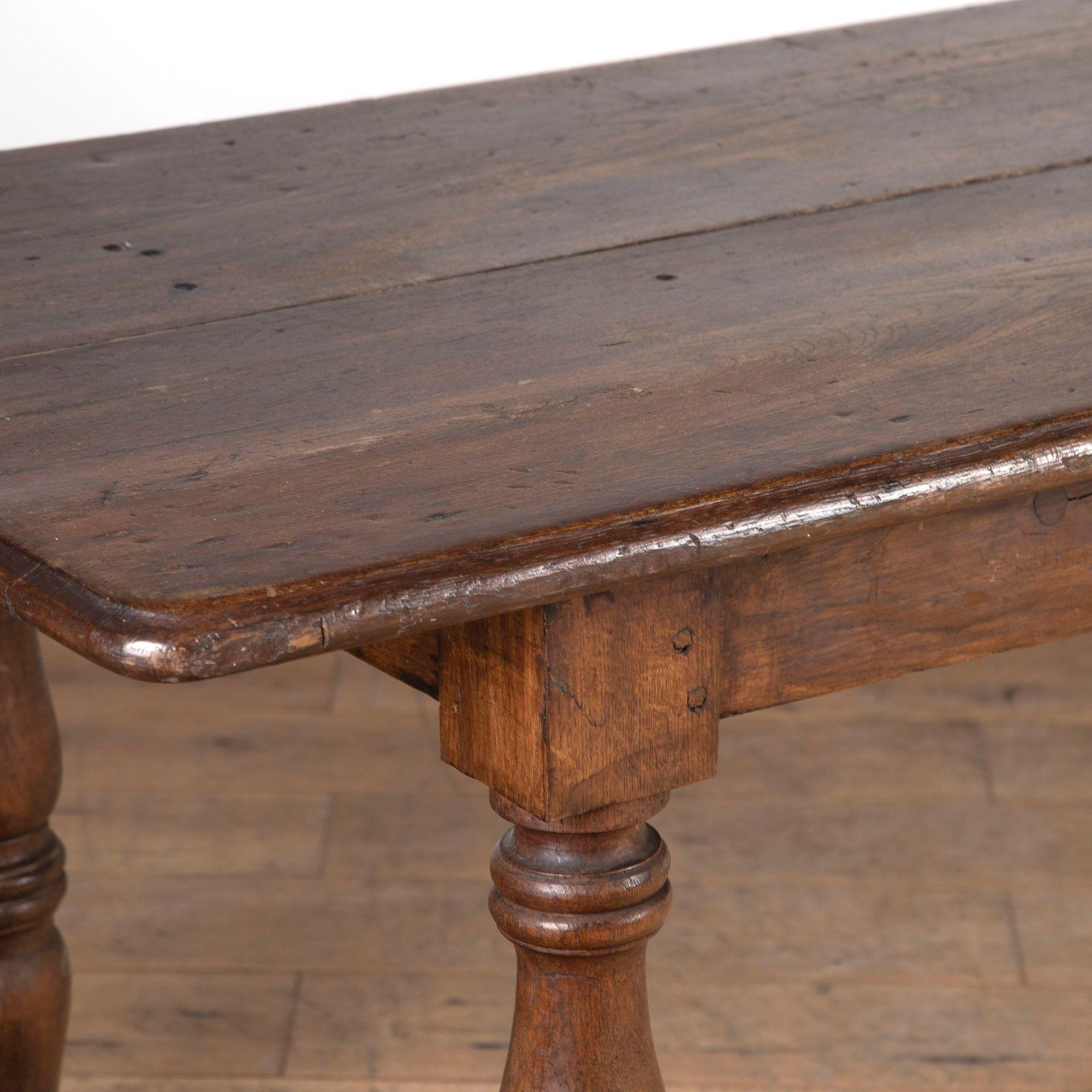 Wonderful 19th century French oak dining table.
A twin planked top and shaped edge sit upon turned supports with square-cut stretchers.
This fabulous dining table seats 8-10 comfortably.