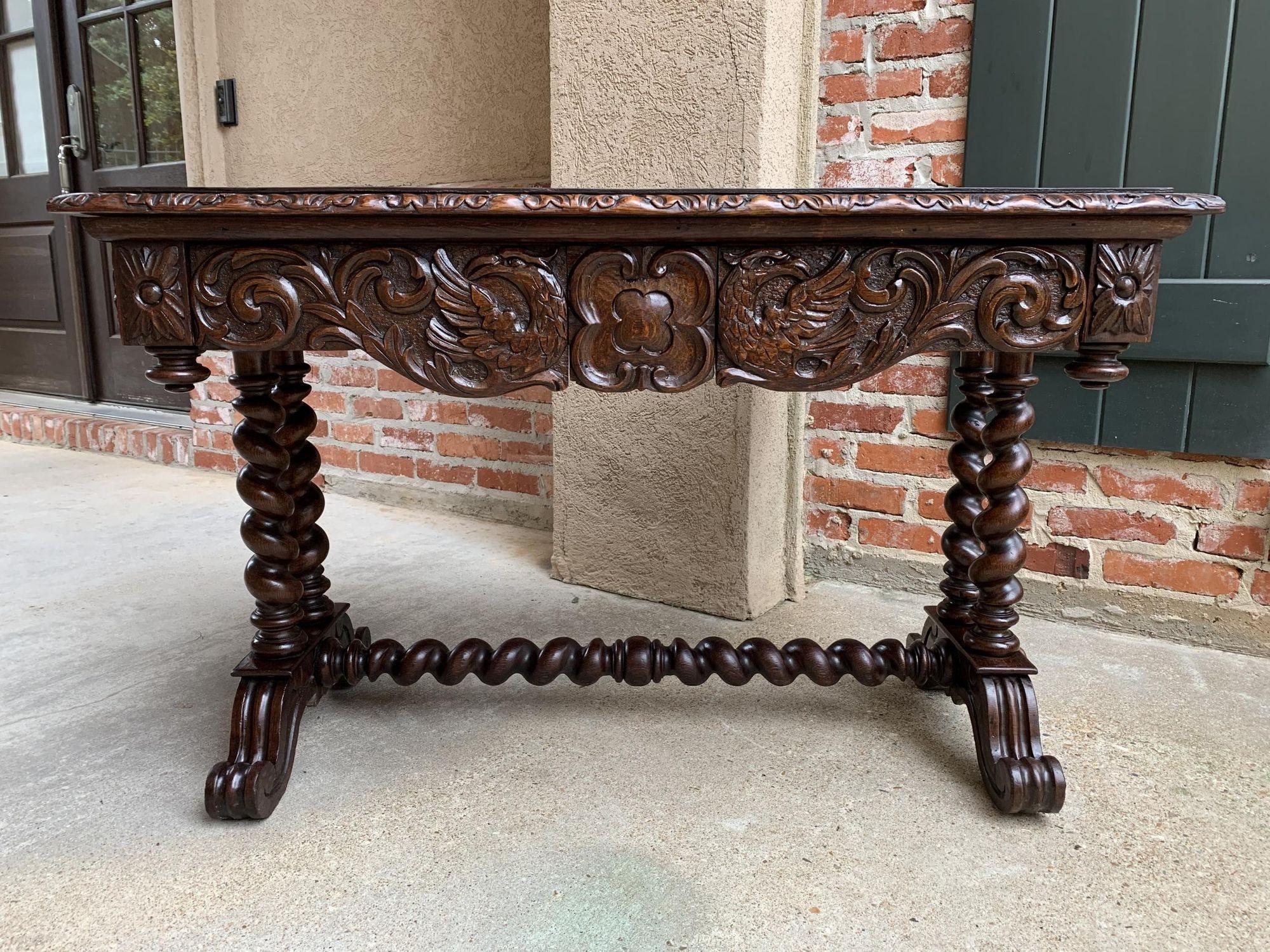Antique French Console Sofa Table Carved Oak Barley Twist Desk Renaissance c1890.

Direct from France, a highly carved antique French sofa table or writing desk, versatile for so many uses throughout your home, carved on all sides and also easily