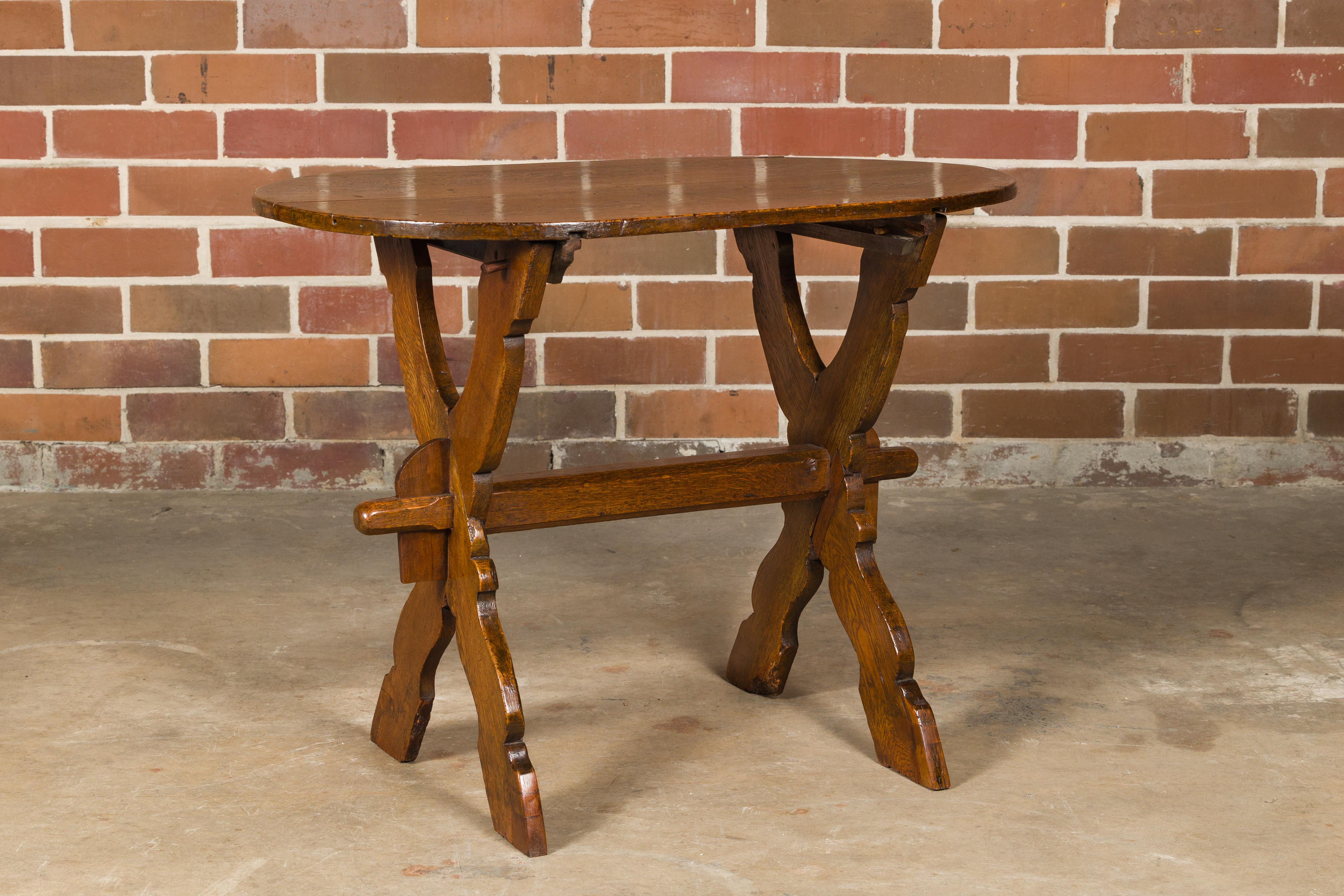 19th Century French Oak Oval Top Trestle Side Table with X-Form Carved Base In Good Condition For Sale In Atlanta, GA