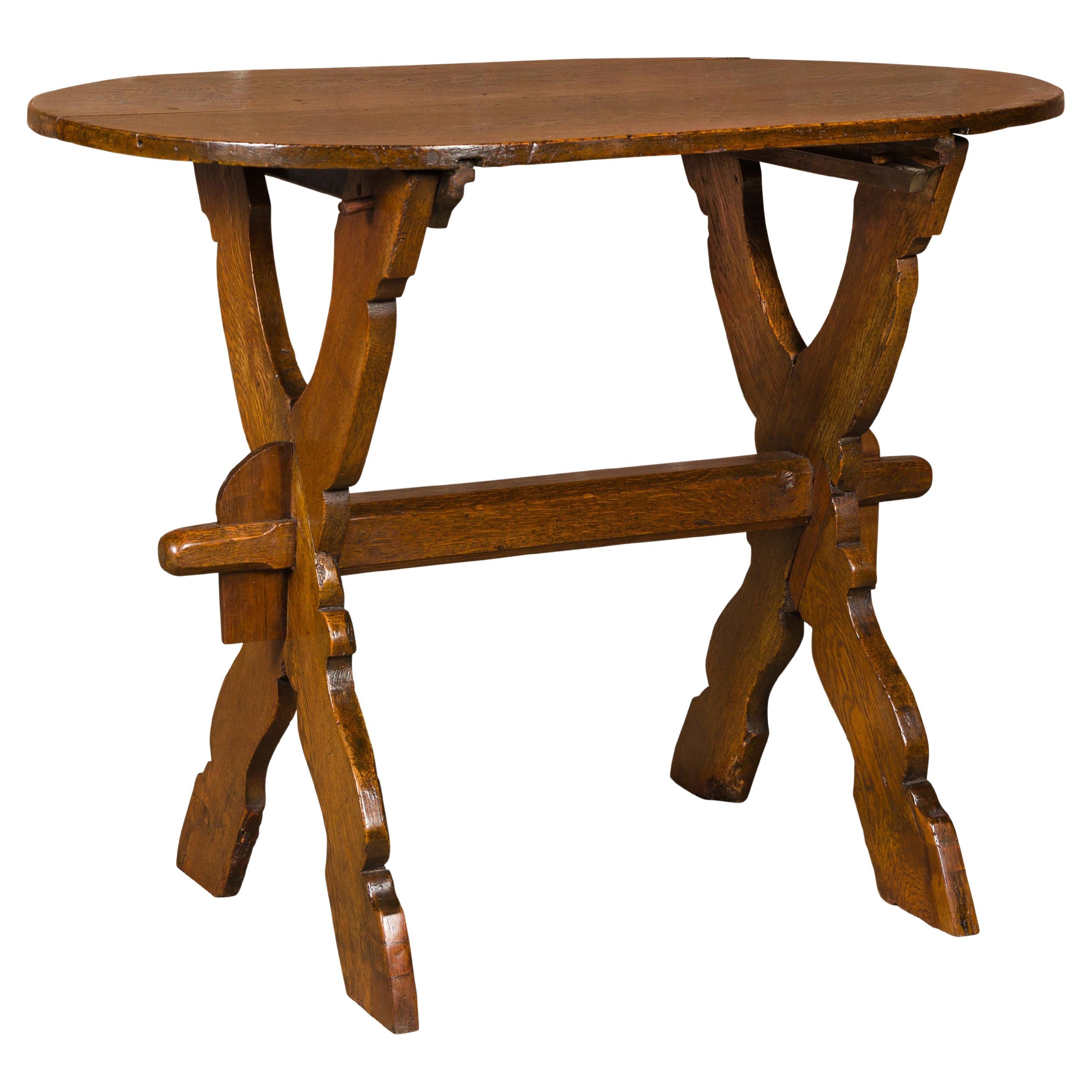 19th Century French Oak Oval Top Trestle Side Table with X-Form Carved Base For Sale