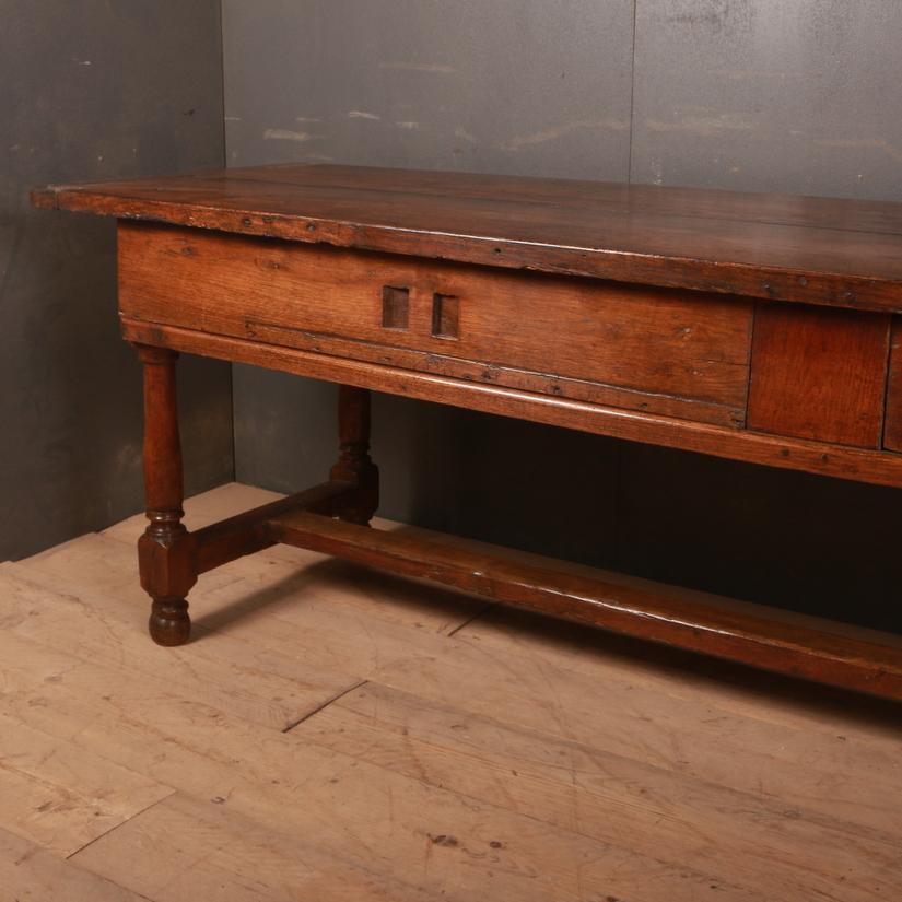 19th century French oak serving table with sliding drawer fronts to reveal a large storage area. Great colour. 1840

Reference: 5813

Dimensions
105 inches (267 cms) Wide
28 inches (71 cms) Deep
30.5 inches (77 cms) High