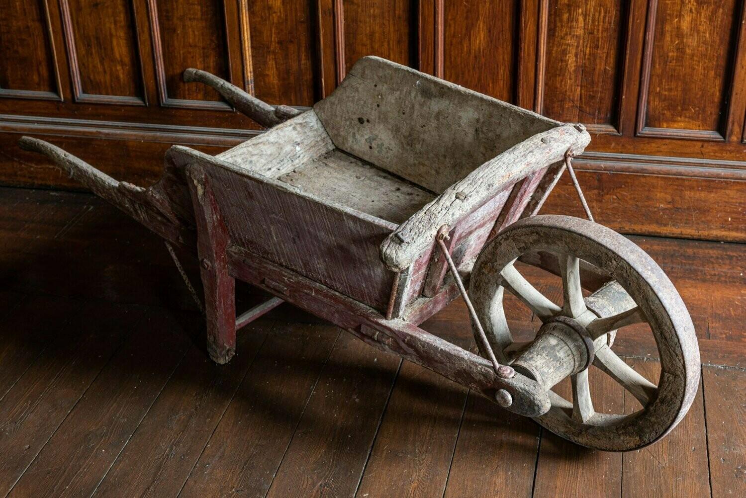 19th century French oak wheelbarrow sourced from the south of France

Great original color and detailing.

Measures: W 172 x H 54 x D 60 cm.