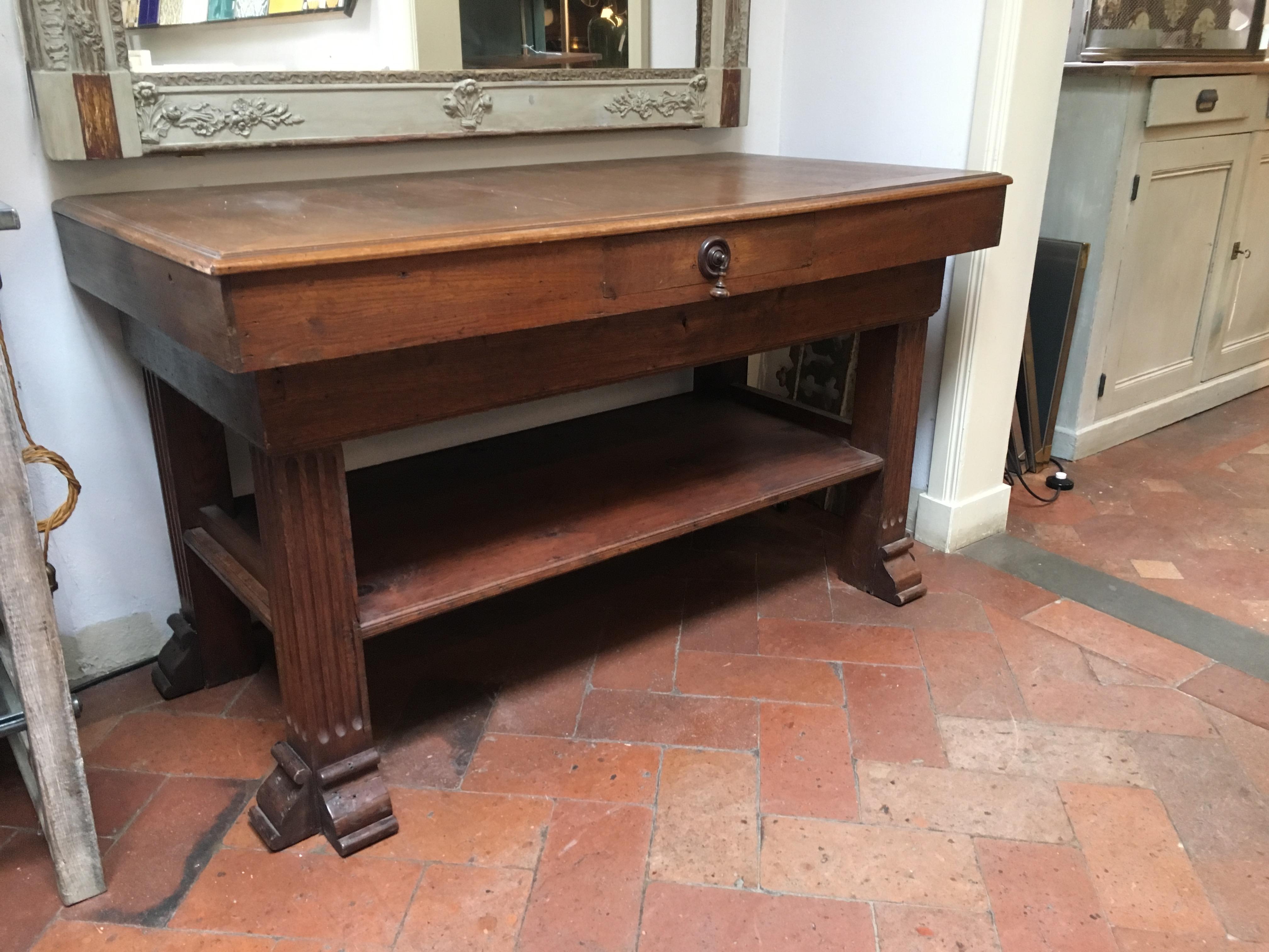 19th century French carved oakwood counter with drawer. 1890s.