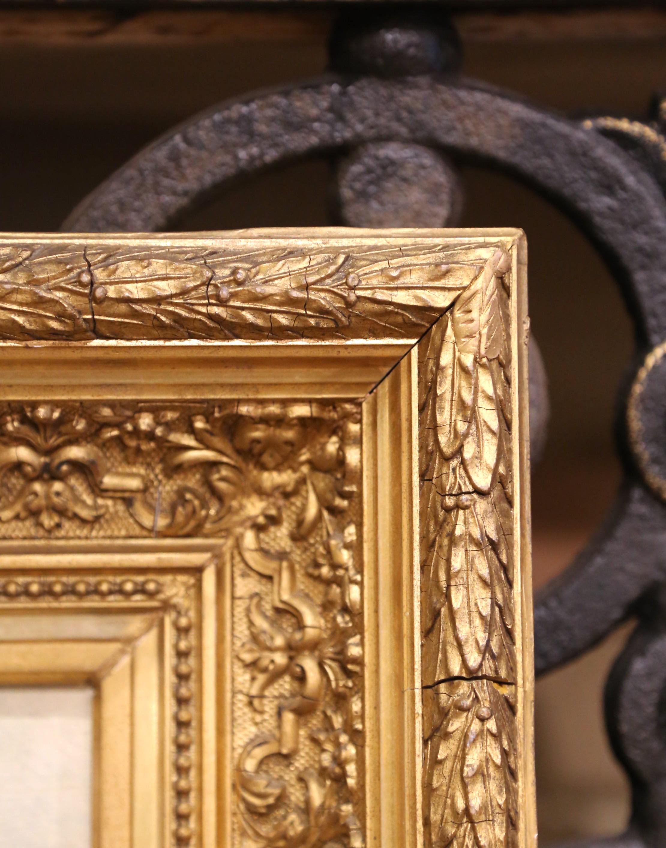 Peinture florale à l'huile sur toile du XIXe siècle dans un cadre en bois sculpté et doré en vente 1