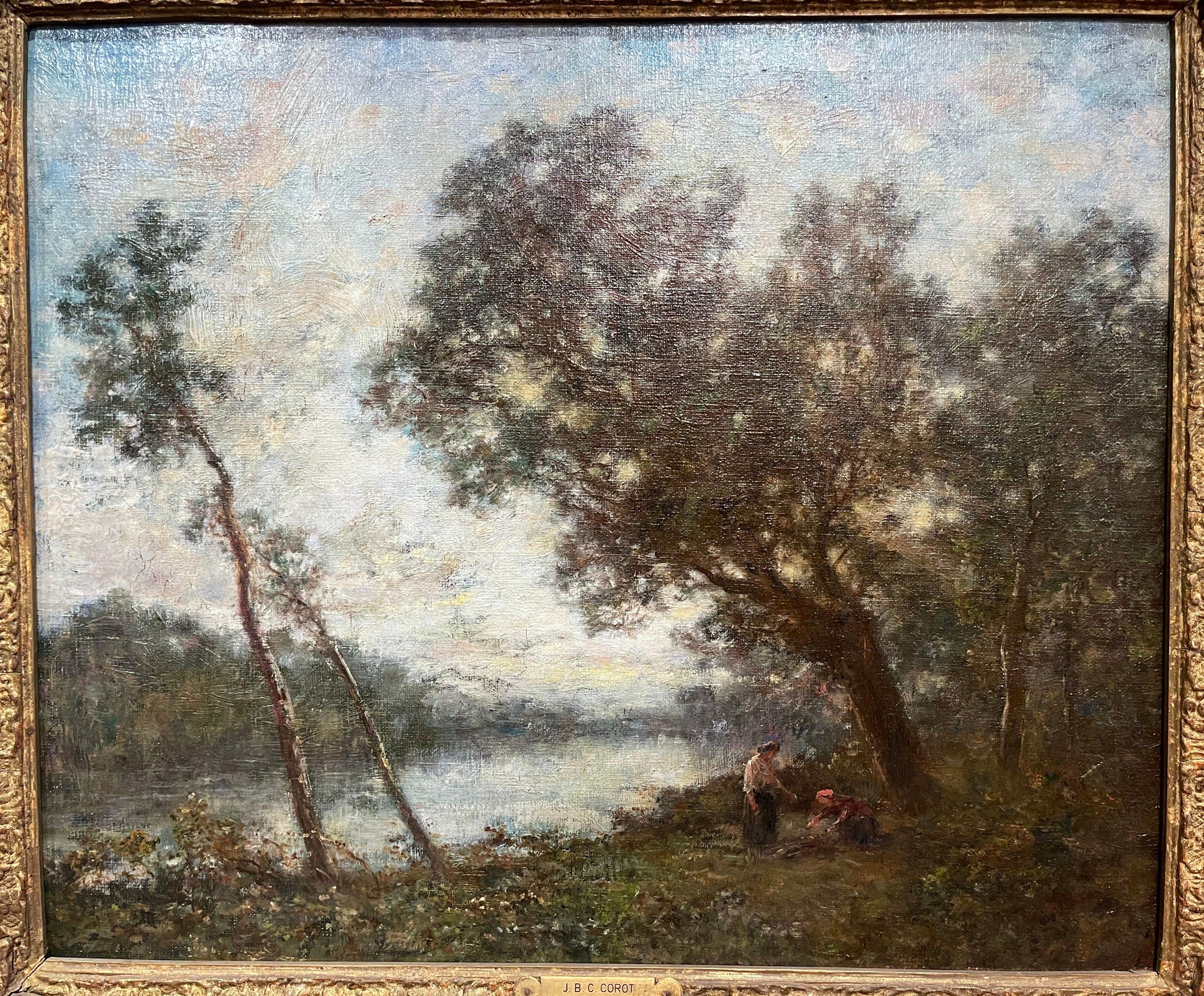 Decorate a dining room table or an office with this elegant antique French oil on canvas painting. Set in the original carved gilt frame, the art work depicts a pastoral scene with two women by the river surrounded with trees and landscape in the