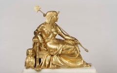 Garniture d'horloge française du 19ème siècle en onyx et bronze doré de style égyptien