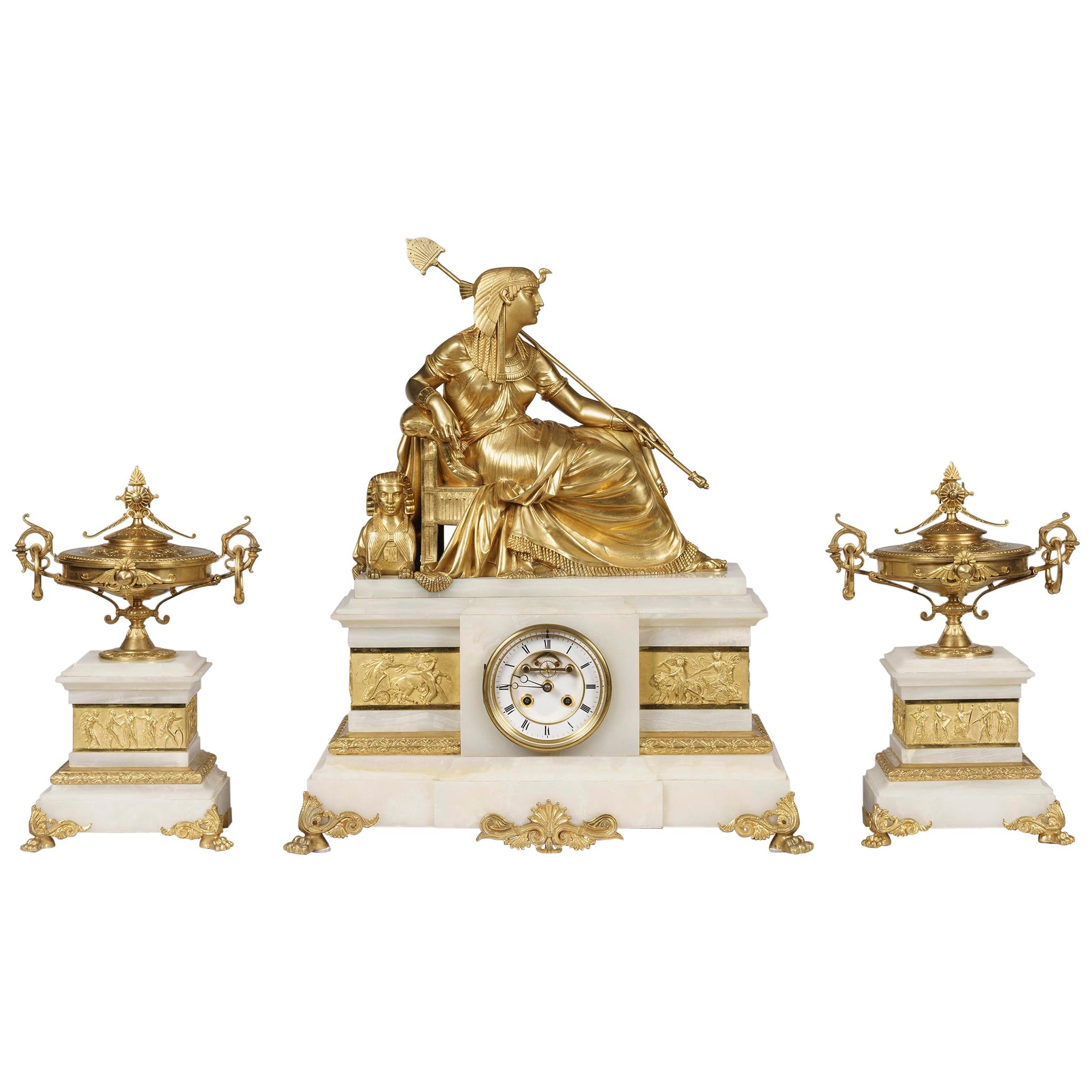 Französische Uhrengarnitur aus Onyx und Goldbronze des 19. Jahrhunderts in ägyptischem Stil