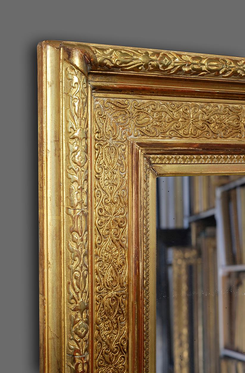 A very fine and rare 19th century French Orientalist neoclassical Revival Salon frame. It has an entablature profile and the following ornament is applied in moulded Plaster of Paris: papyrus flower sight; Arabian interlacing in frieze; vertebrate