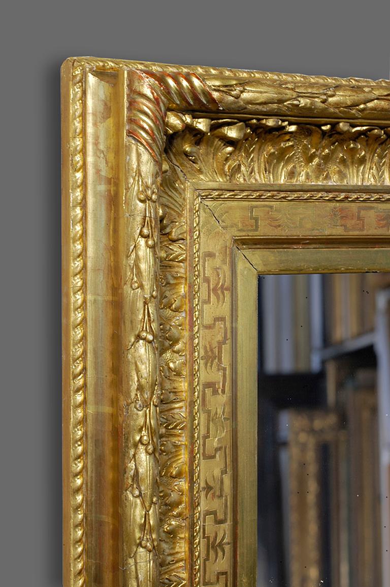 A lavish and luxurious very fine 2nd half 19th century French Orientalist neoclassical revival salon frame. It has a concave section with a stepped frieze, with the following ornament molded in plaster of Paris: fretwork and stylized palms engraved