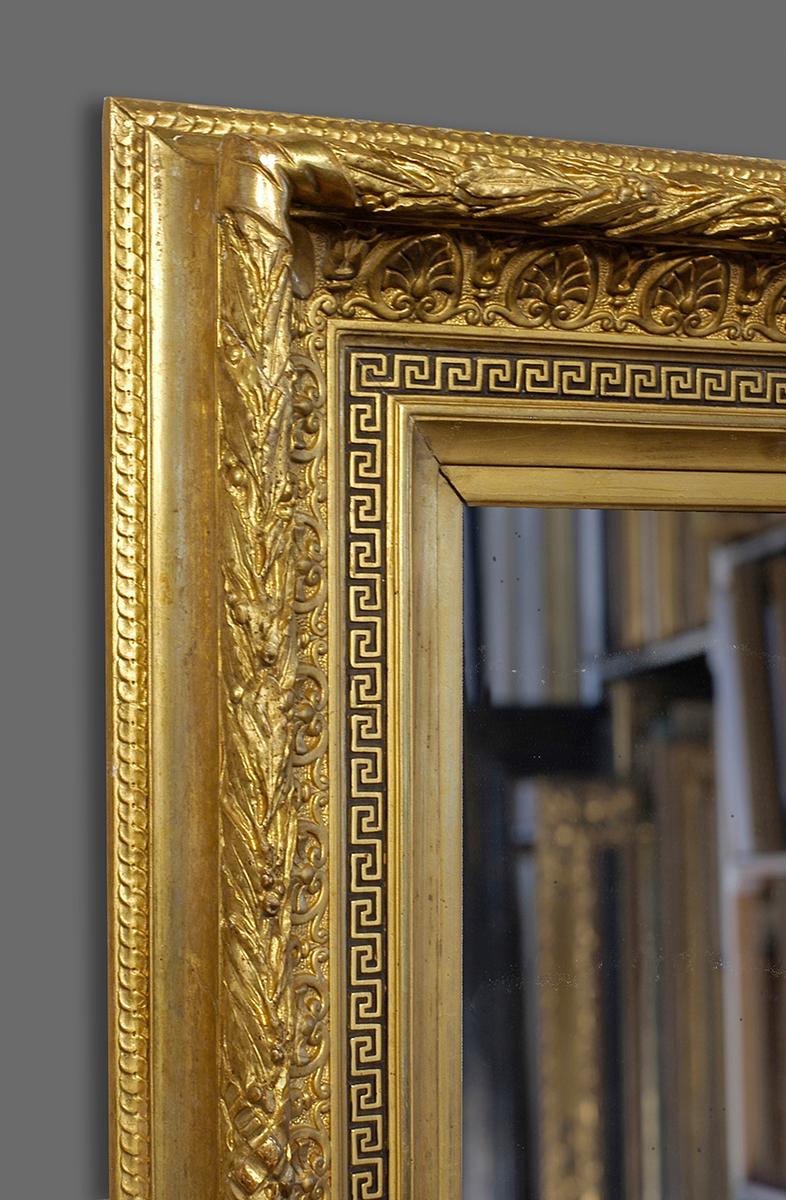 A very rich and lavish 4th quarter 19th century French Orientalist neoclassical revival frame. It has a concave with stepped frieze profile, with the following ornament applied in molded plaster of Paris: fretwork on black ground in frieze;